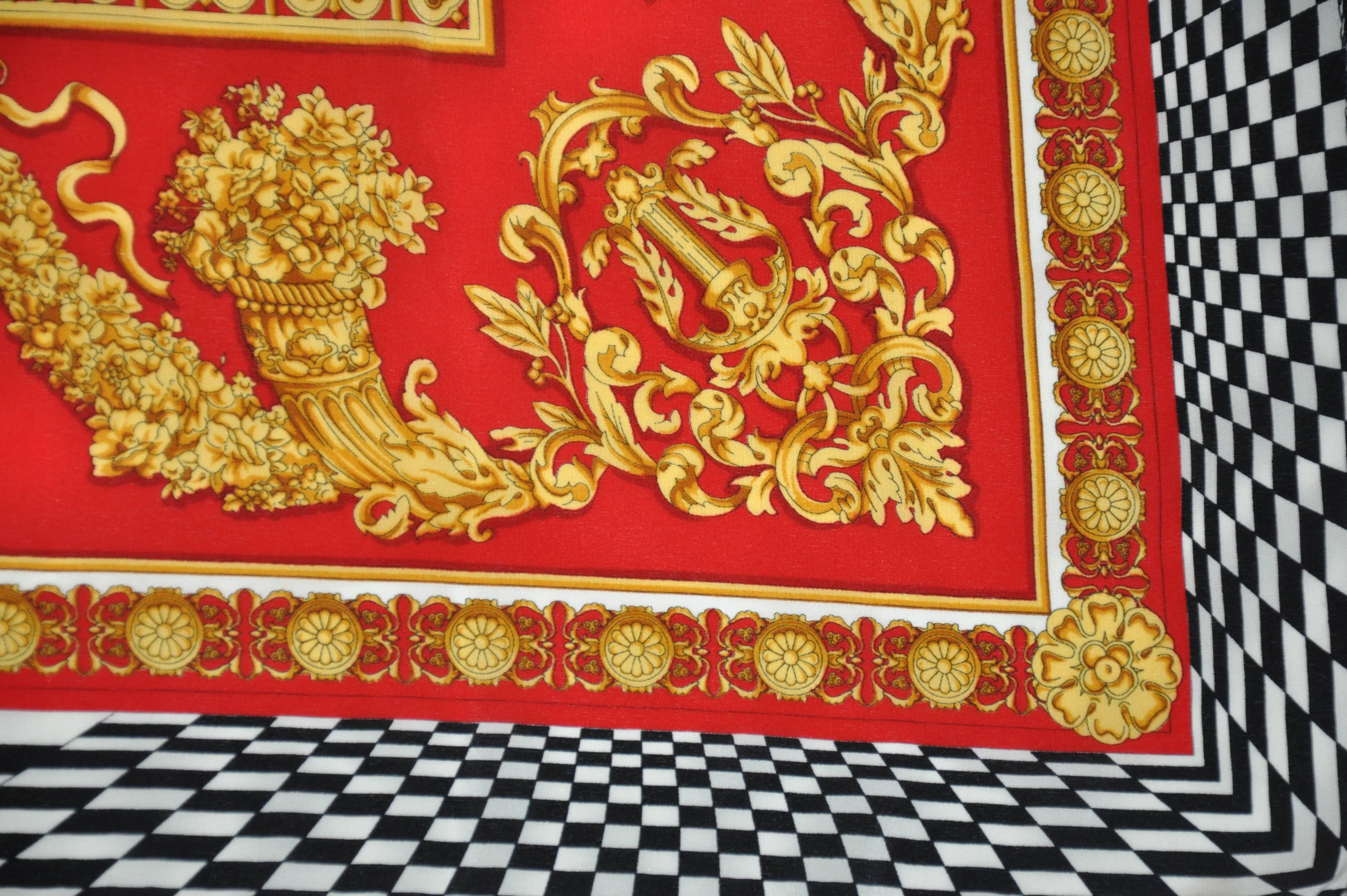         Ce foulard en soie multicolore à l'effigie de 