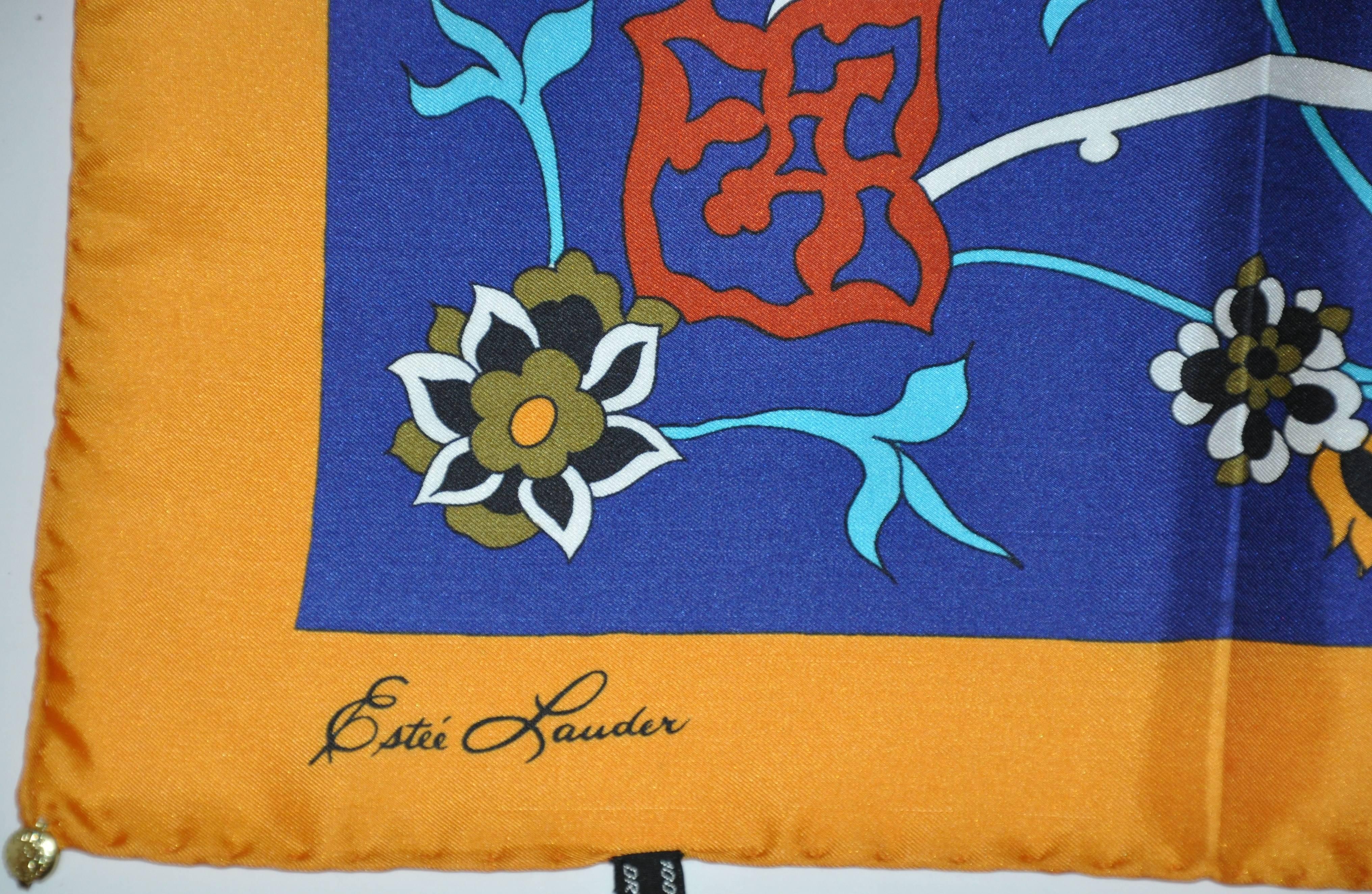        Estee Lauder wonderfully elegant bold multi-color floral silk scarf measures 30