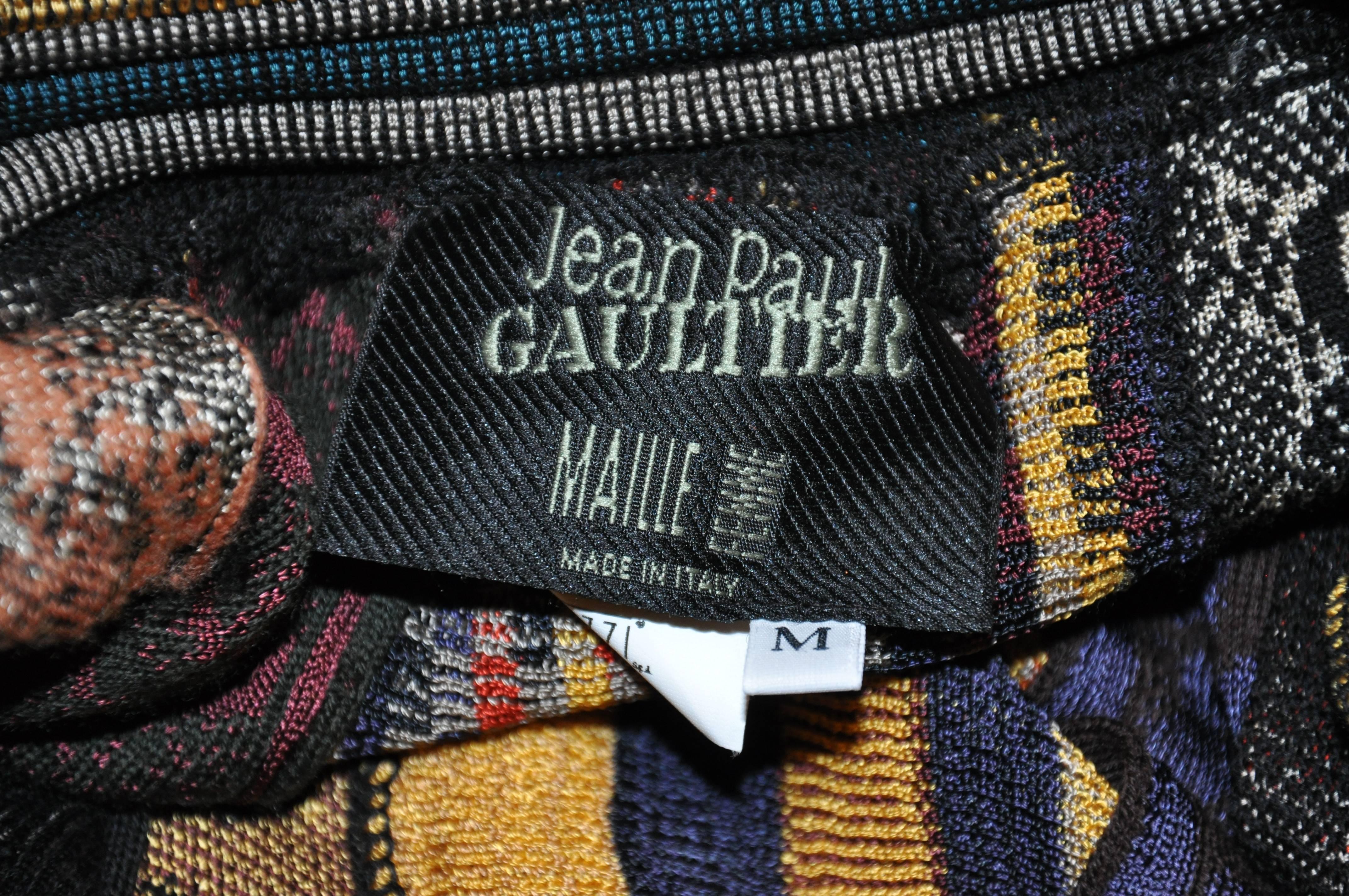            Jean Paul Gaultier wonderfully wicked at his best, optional strapless fringed dress & fringed maxi skirt. The multi-hand-knotted fringed measures 7 1/2