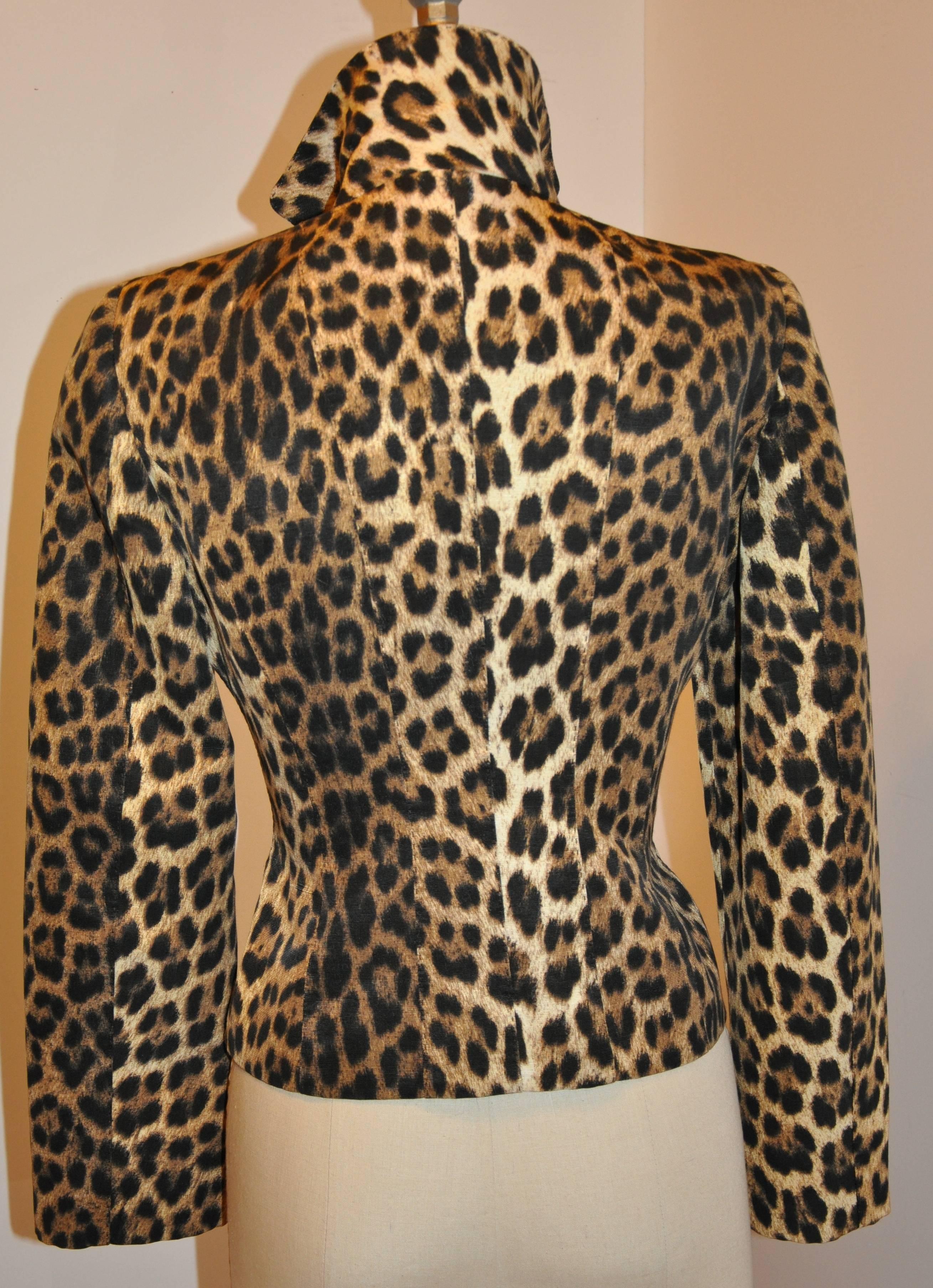        Moschino for Bergdorf Goodman wonderfully wicked leopard print button jacket is fully lined. The front has five buttons as well as two set-in pockets and flaps for a more polished elegant appearance. Made of 60% cotton and 40% rayon, the