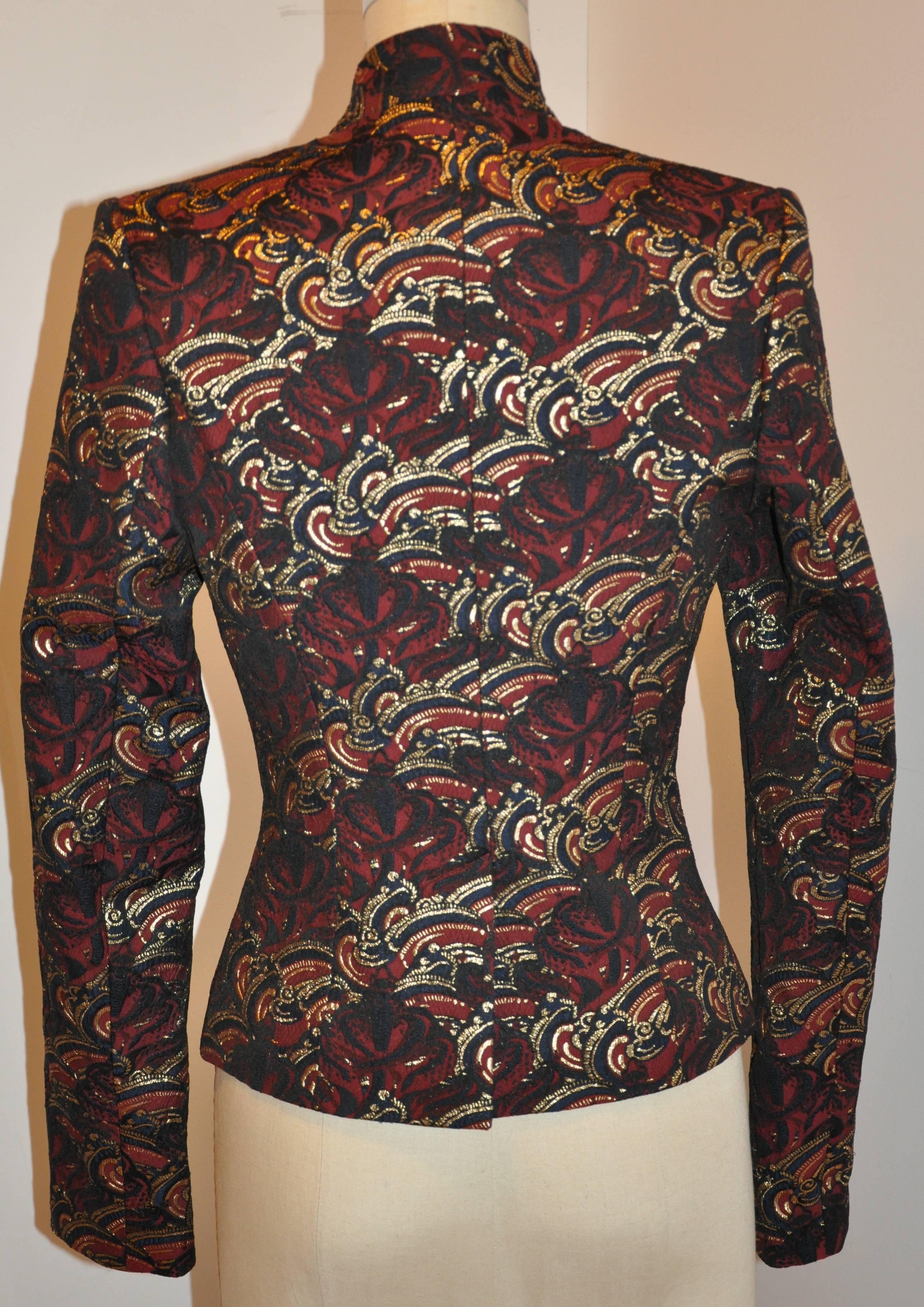        Iconic Kenzo wonderfully elegant kimono style front jacket in multi colors accented with metallic gold thread throughout. The collar stands at 1 3/4