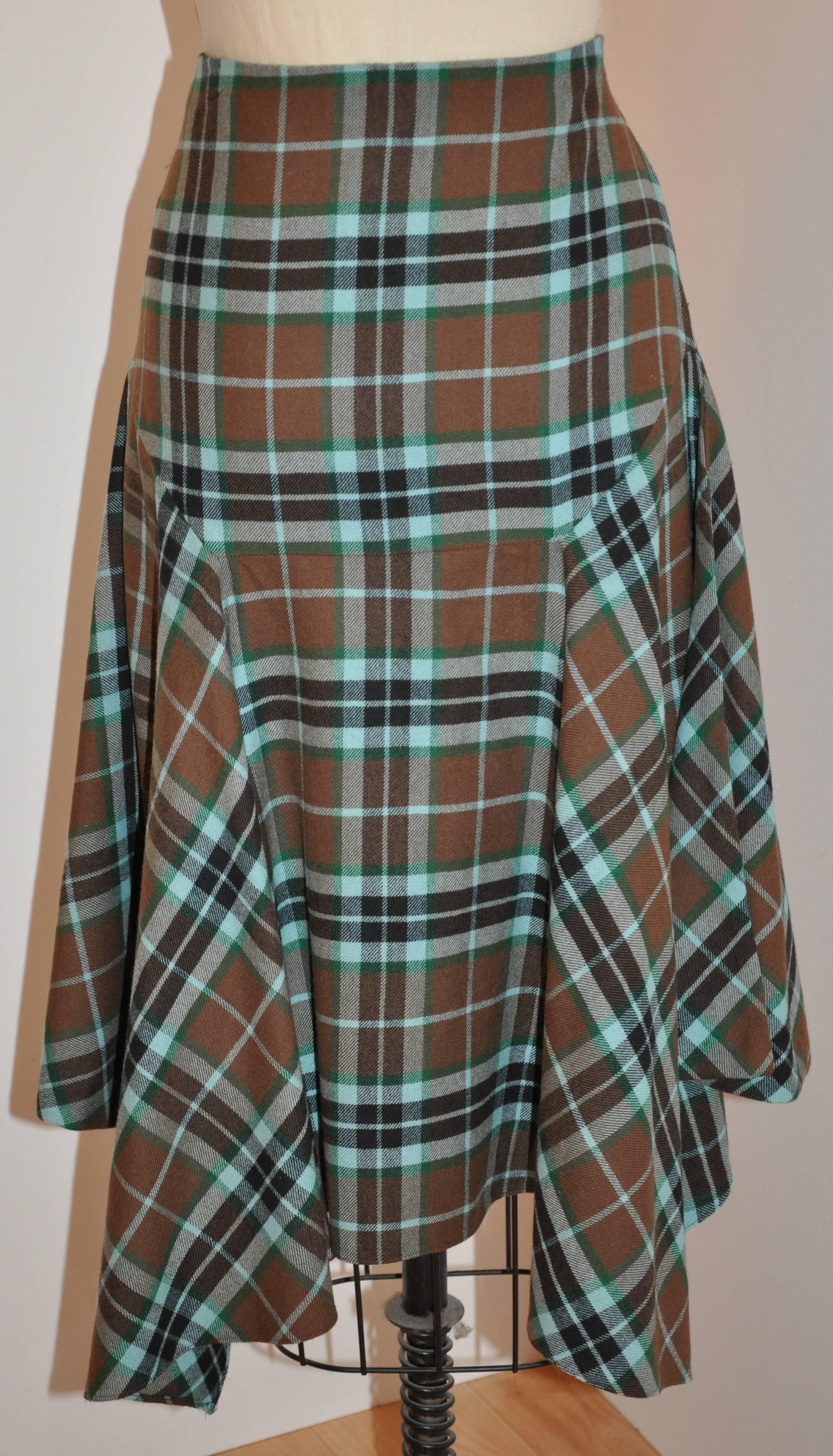        Givenchy wonderfully detailed multi-colored plaid deconstructed skirt has a side invisible zipper which measures 7