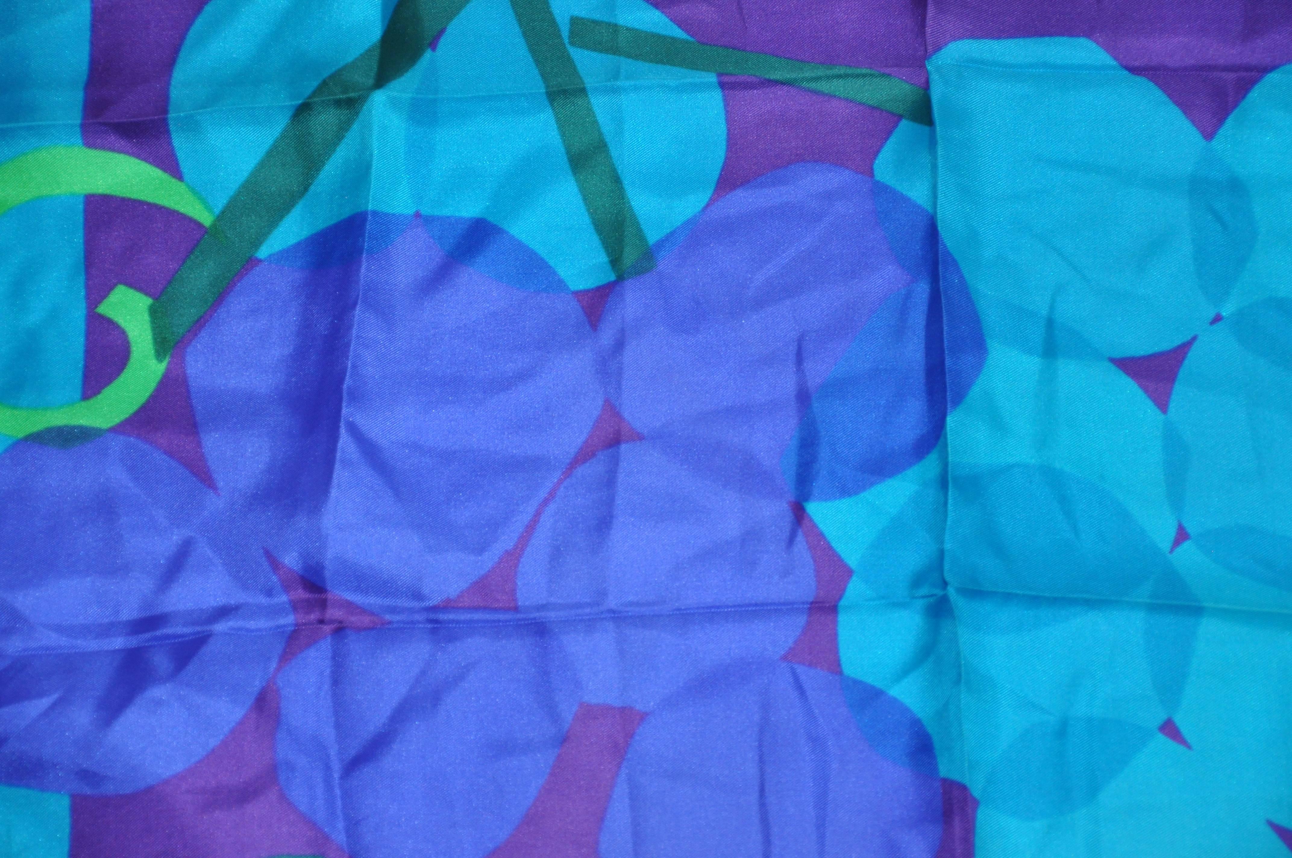 Vera bold multi-color abstract silk scarf measures 27