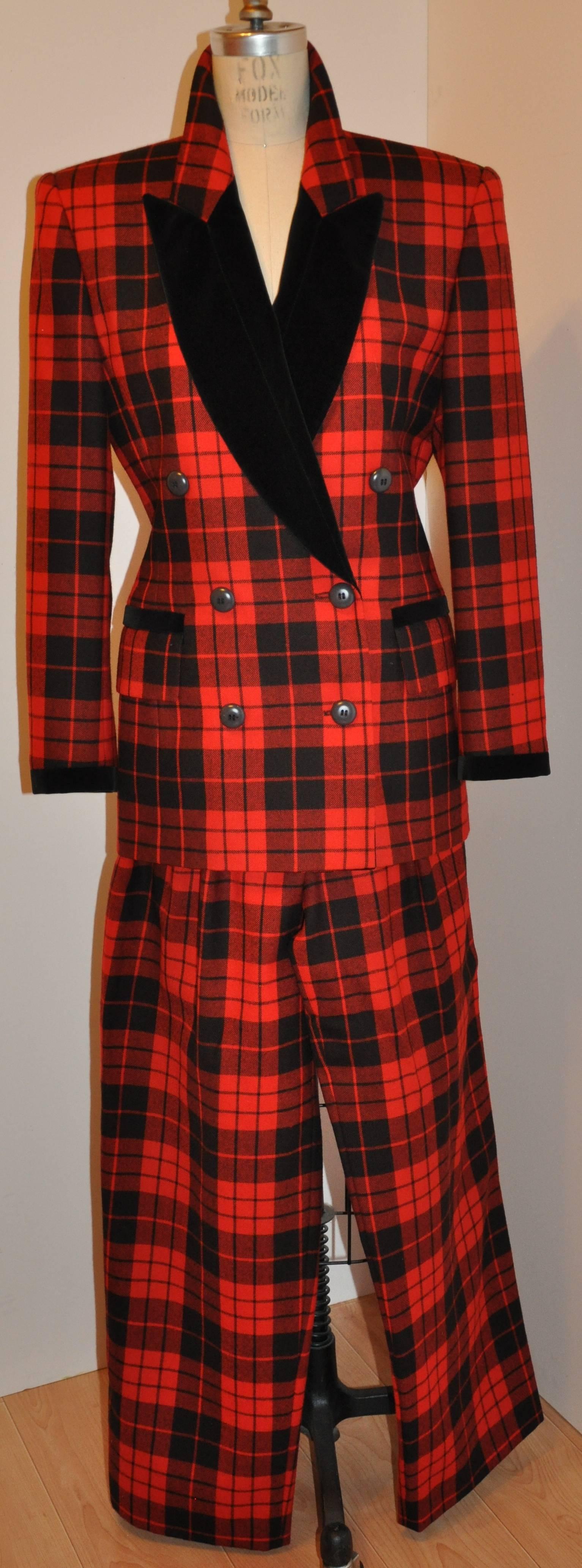         Escada by Margaretha Ley wonderfully detailed red and black plaid three piece ensemble consists of a double breasted blazer with a matching pleated maxi wrap skirt as well as a pair of trousers. The blazer is accented with black cotton