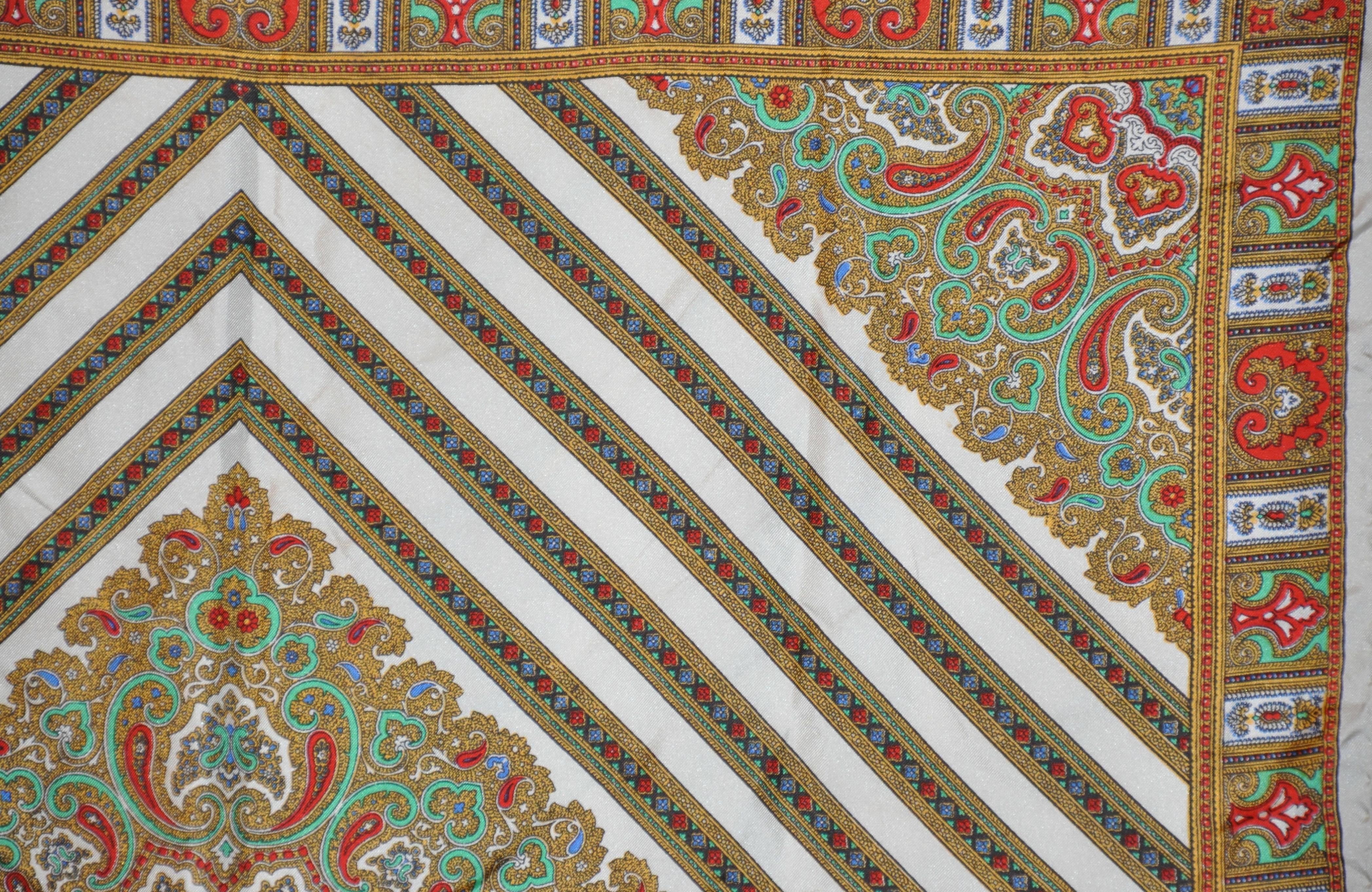          Handcraft's wonderful multi-color multi-palsey print silk scarf measures 26