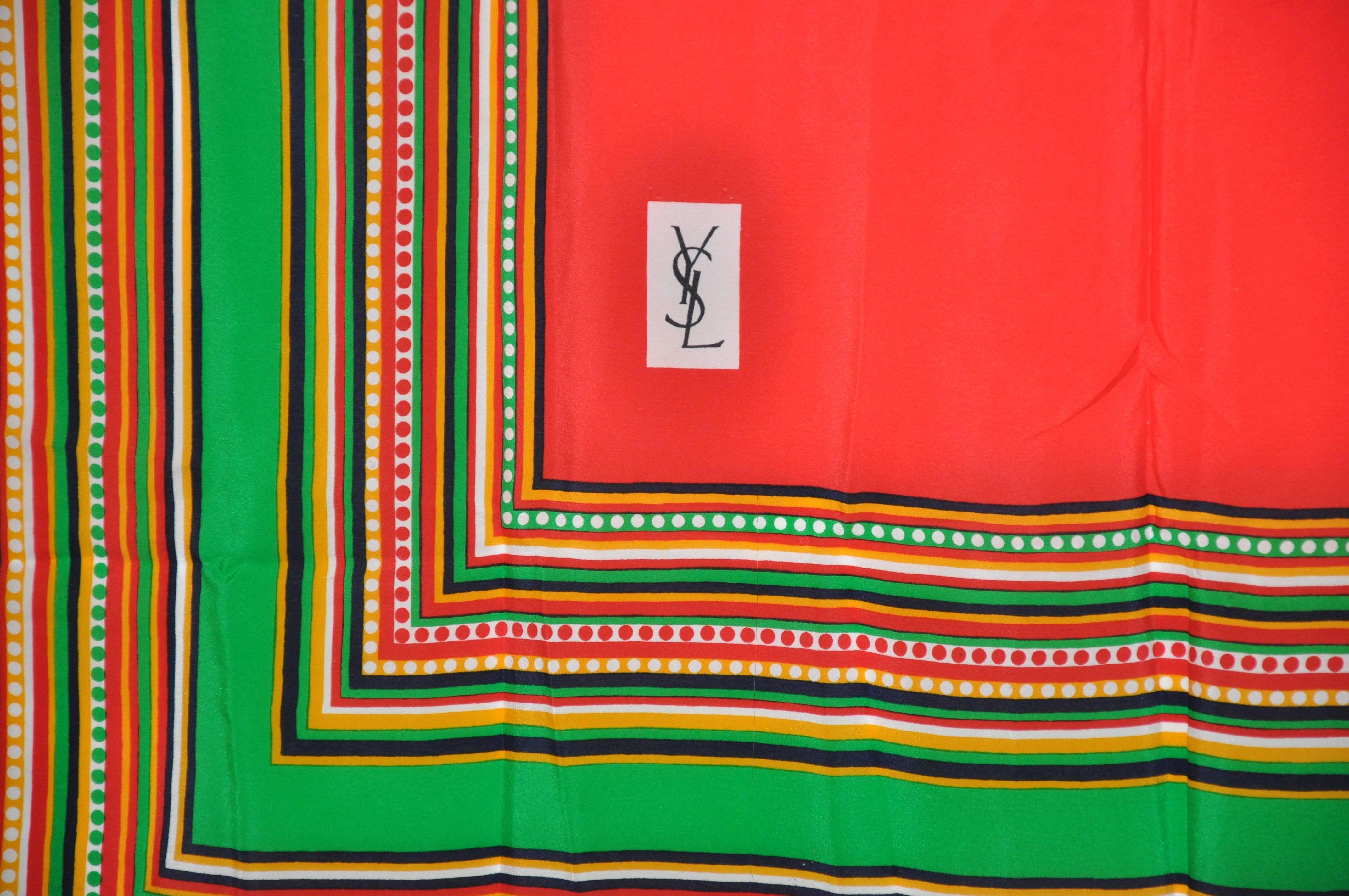      Yves Saint Laurent's wonderfully elegant multi-stripe with bold colors as well as a bold red center silk scarf is finished with hand-rolled edges.  This wonderful elegant silk scarf measures 34