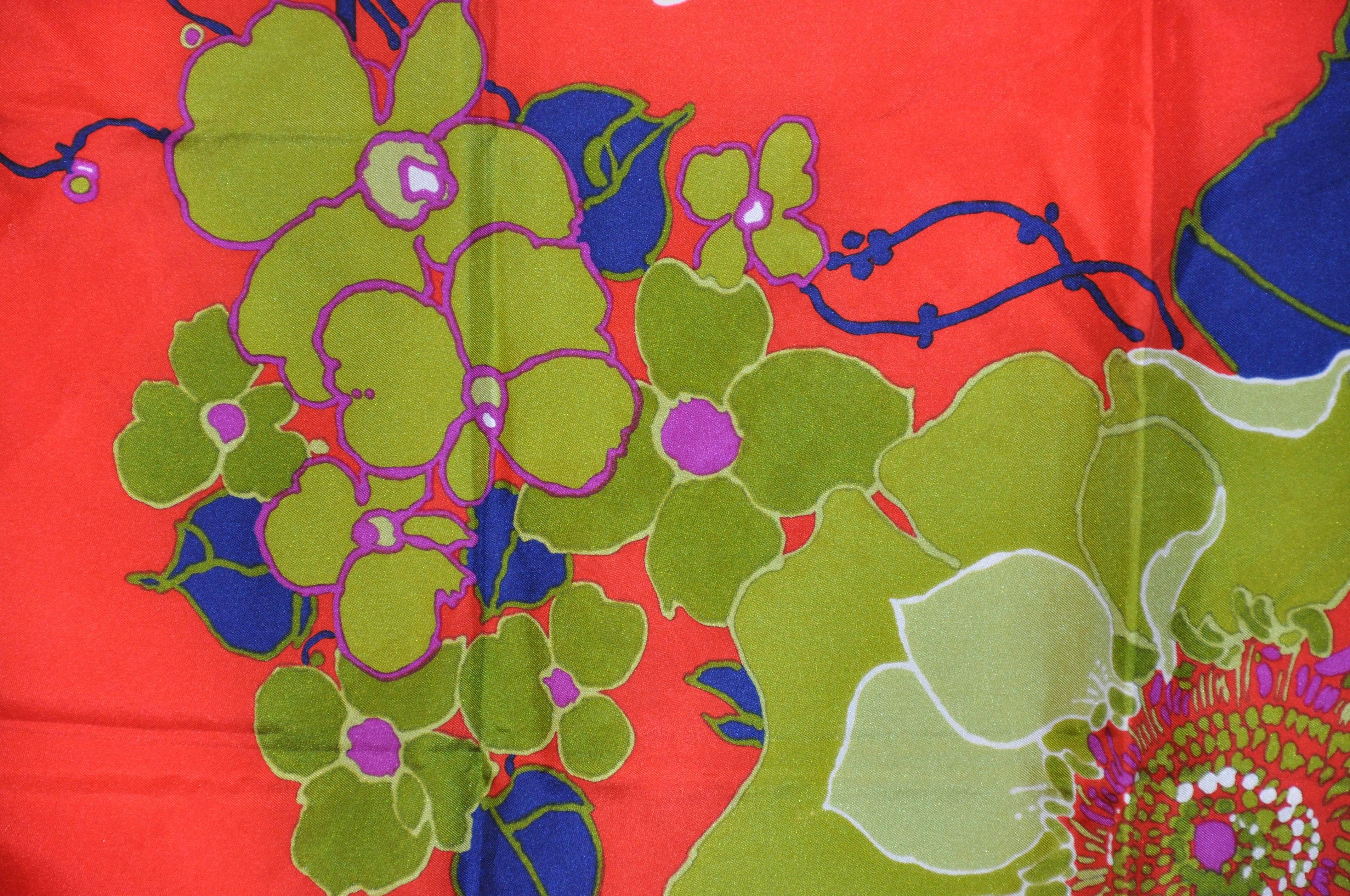         Christian Dior's wonderfully elegant bold floral silk scarf measures 31