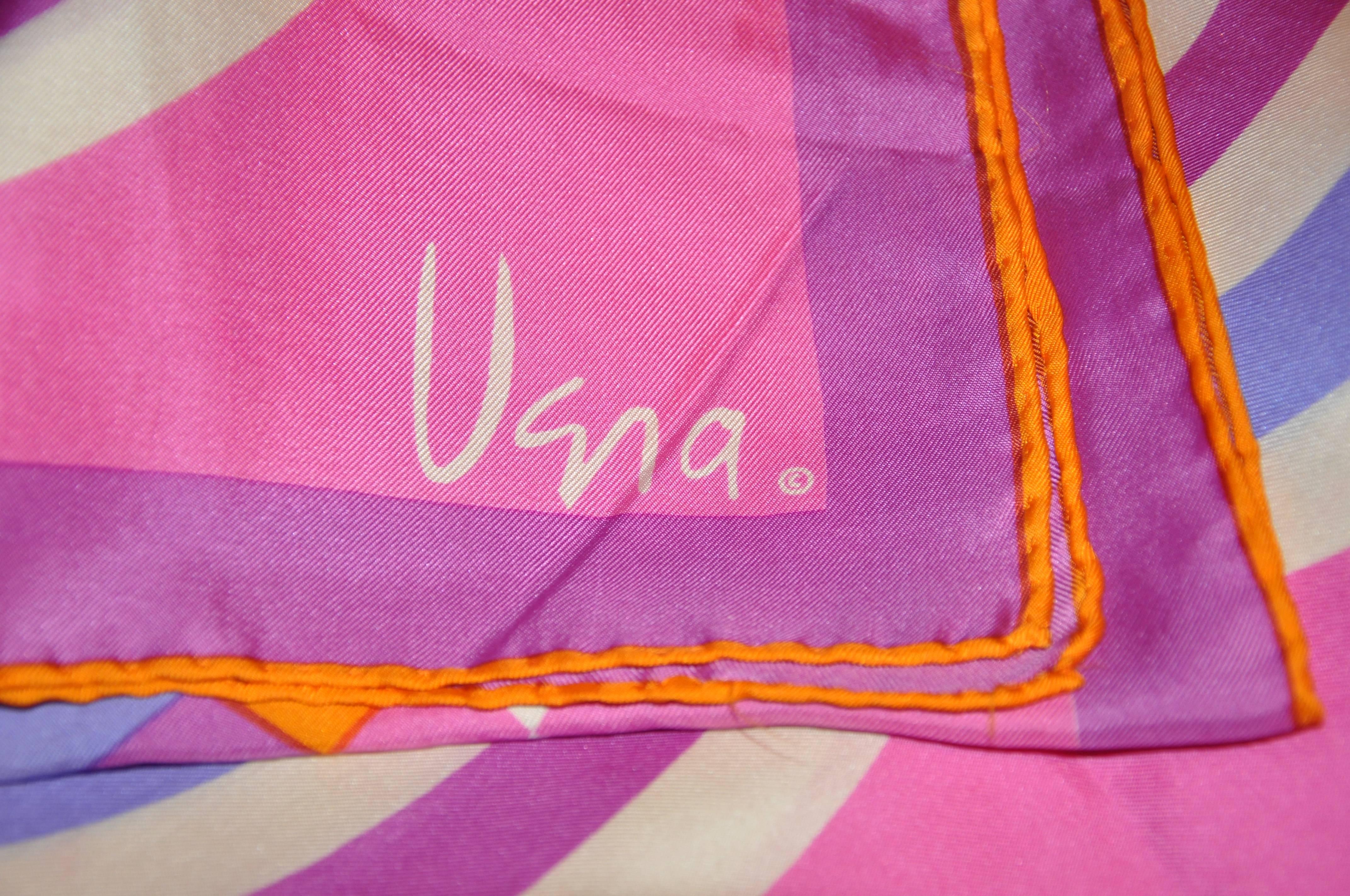          Vera's wonderfully bold, bright and colorful fuchsia abstract silk scarf measures 15
