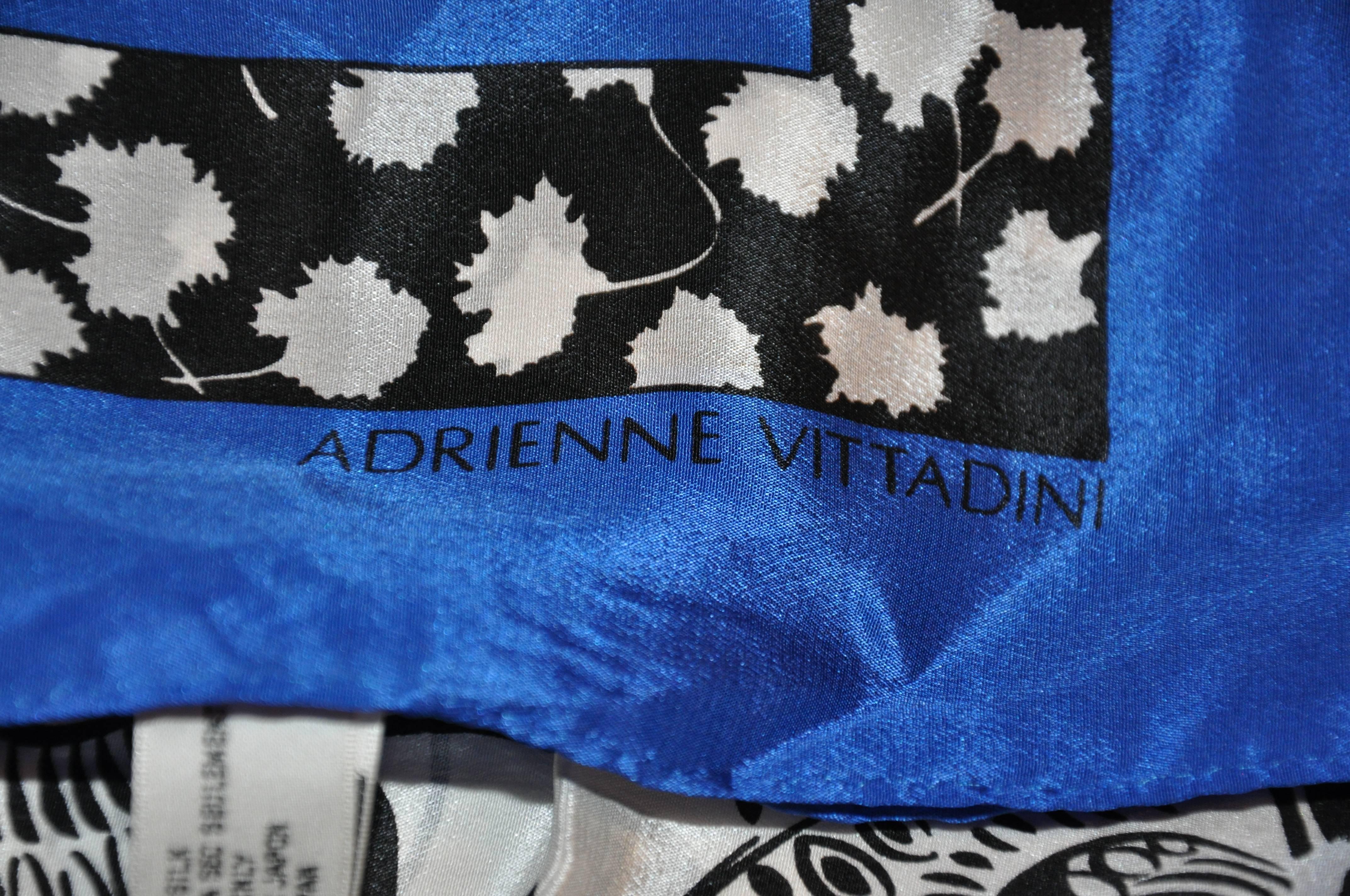        Adrienne Vittadini wonderfully bold floral silk scarf with colors of navy, white and black measures 32