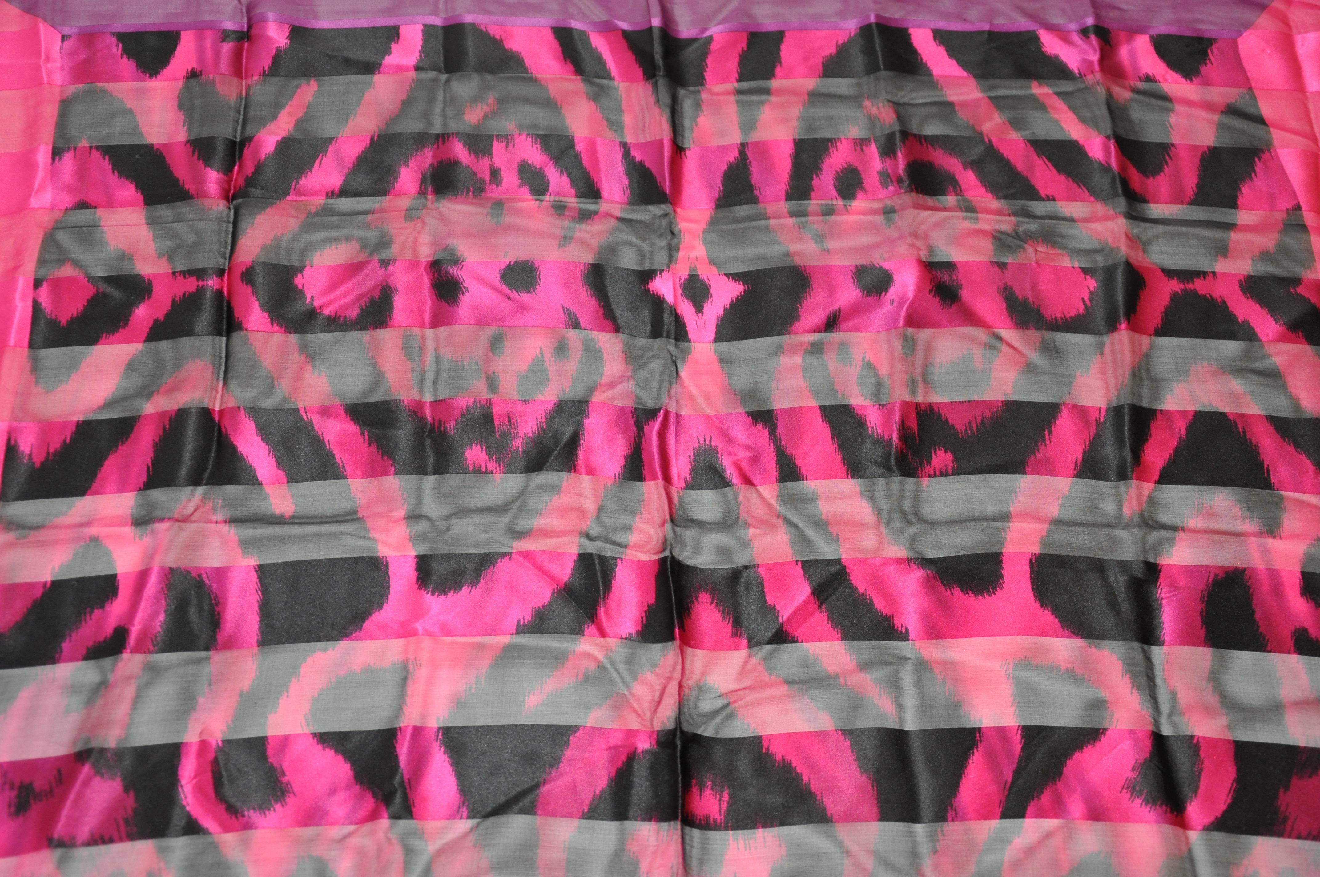        Adrienne Vittadini wonderful combination of silk and silk chiffon in multi-shades of fuchsia and black is finished with rolled edges and measures 35