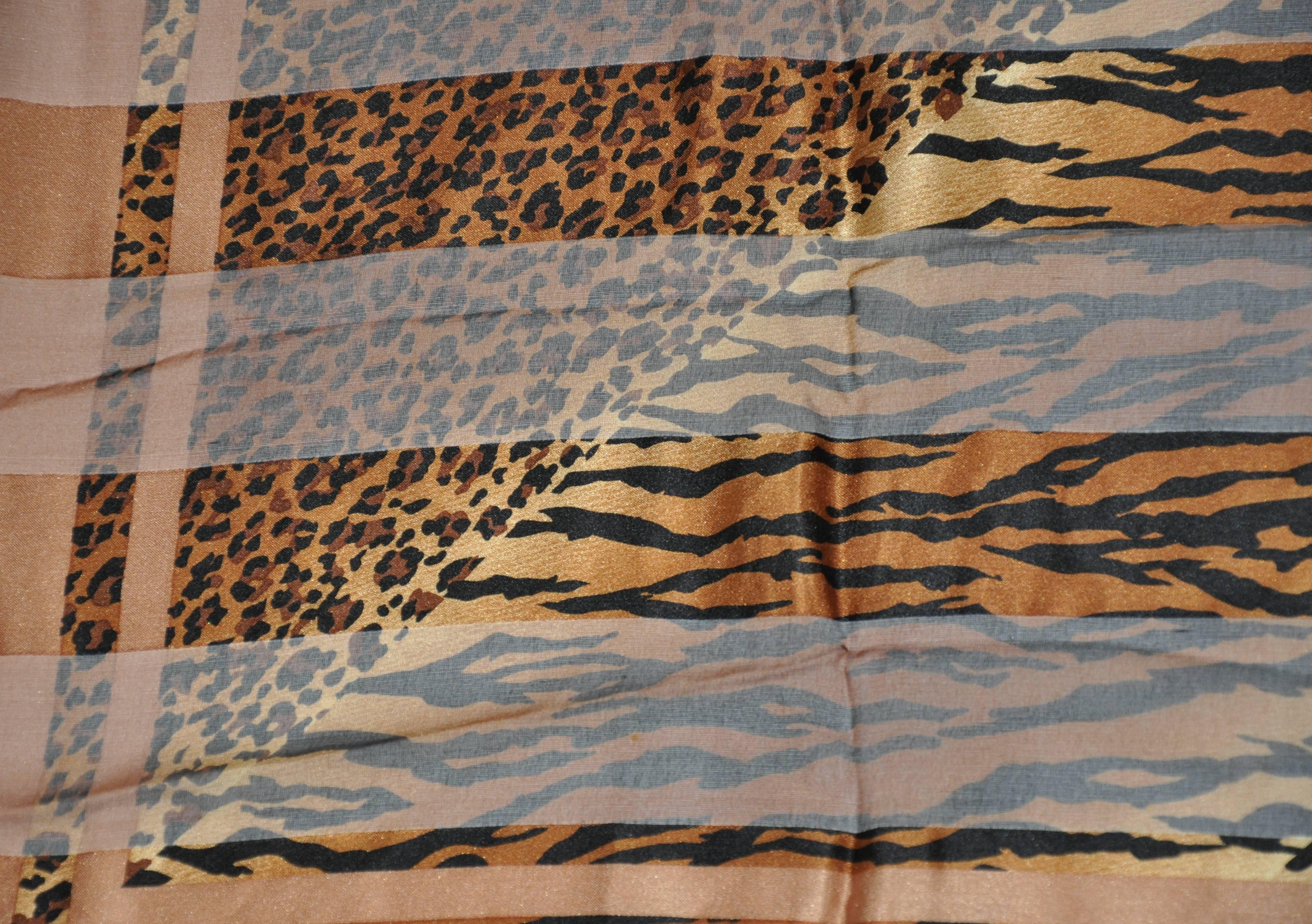 Adrienne Vittadini "multi-size leopard print" combination of silk and silk chiffon scarf measures 34" x 34". Made in Italy.