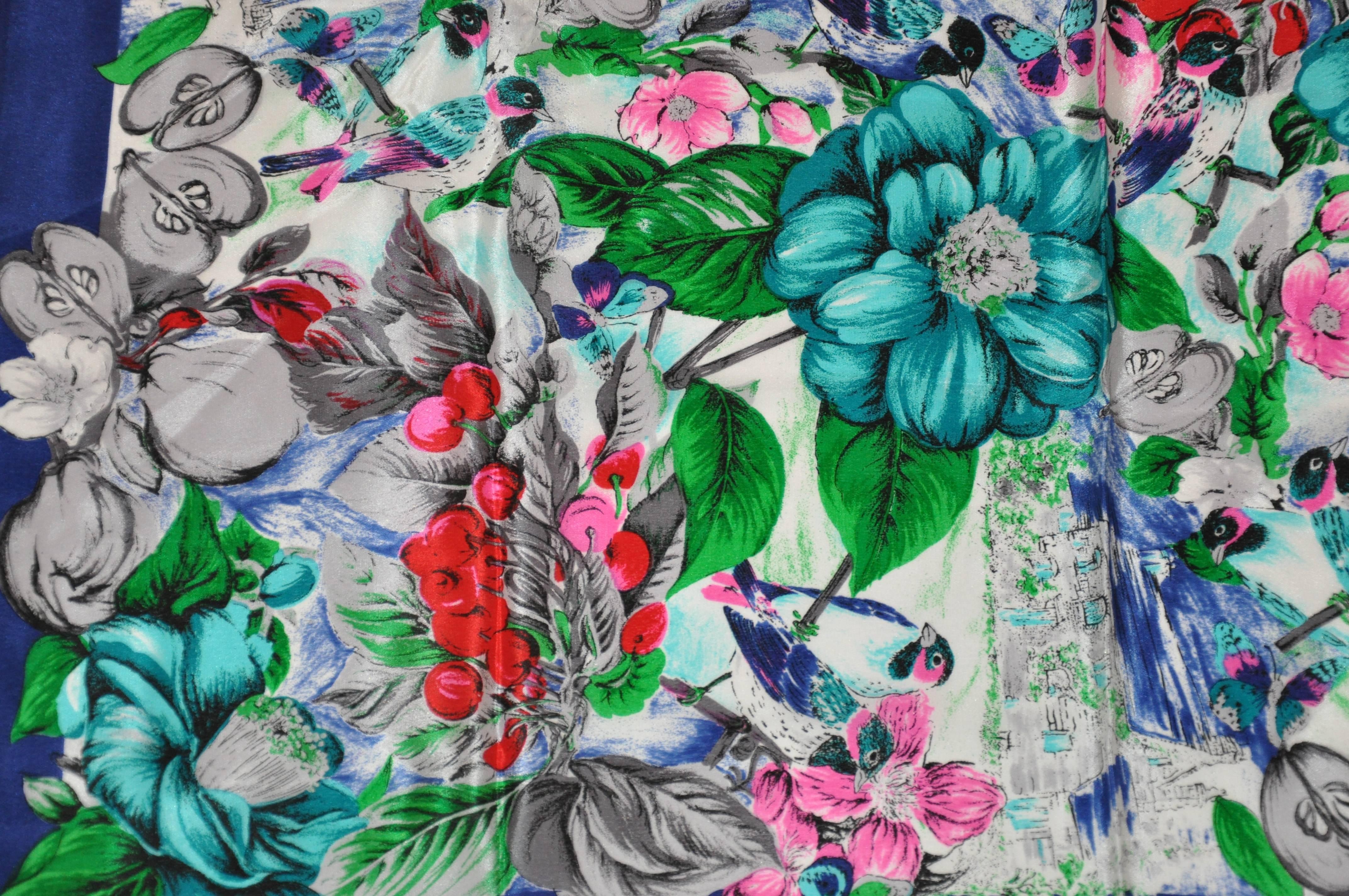 "Garden of Fruits, Flowers & Birds" silk scarf measures 30" x 30" and finished with hand-rolled edges. Made in Italy.