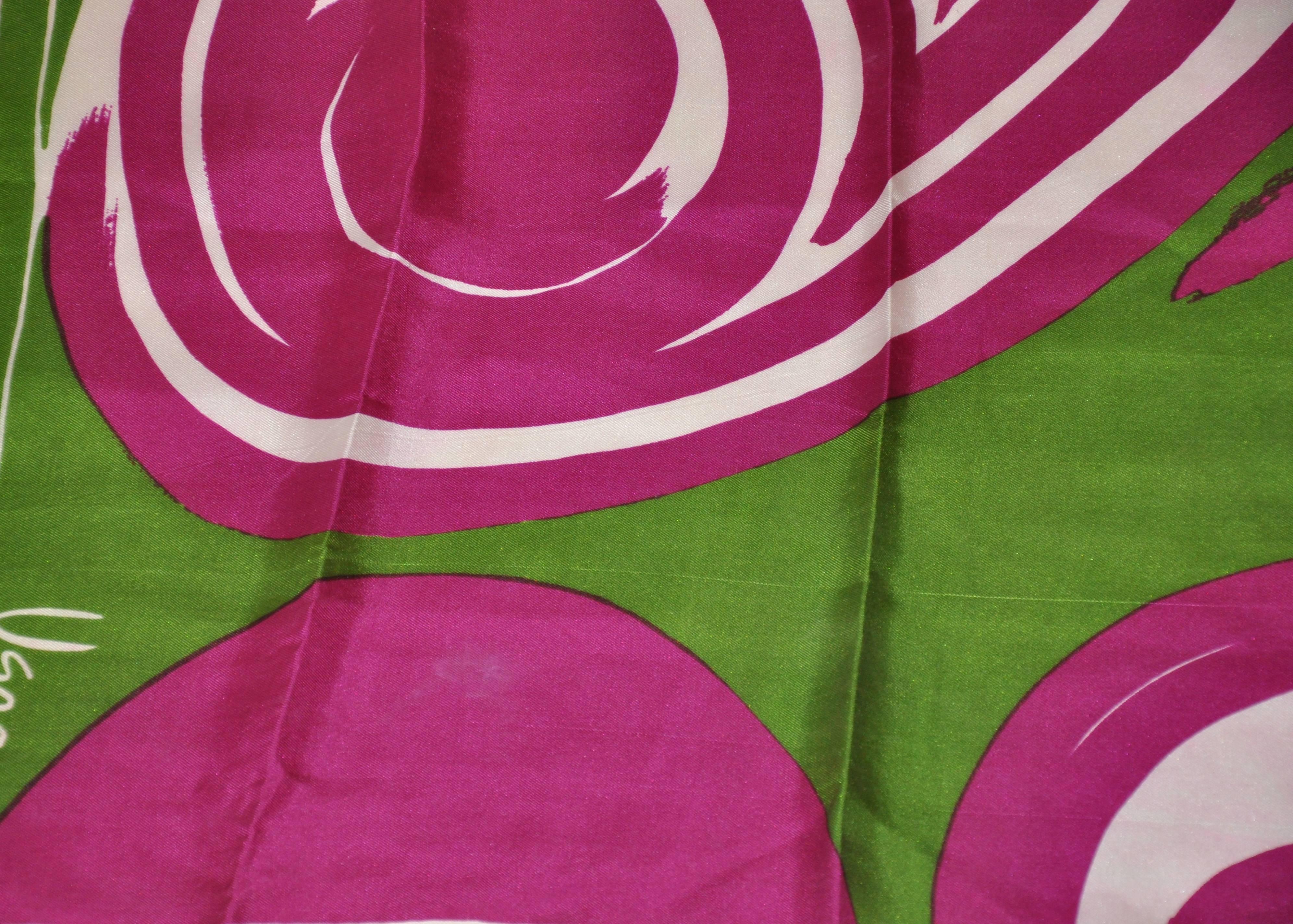 Vera "Olive with Plum circles" silk scarf measures 15" x 44" and finished with hand-rolled edges. Made in USA.