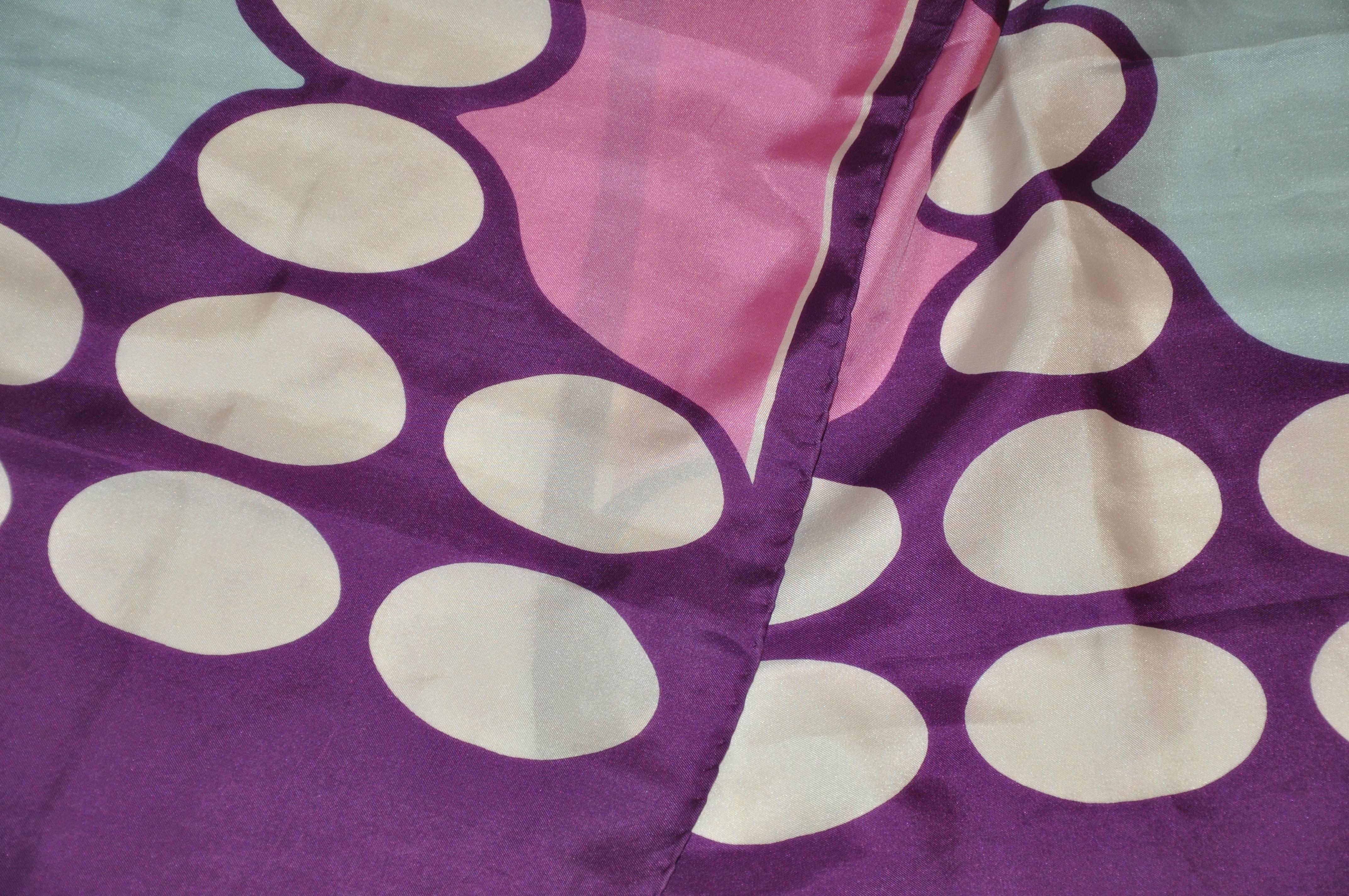Christian Dior purple silk with oval center rectangle scarf is accented with silk fringed edges and measures 14