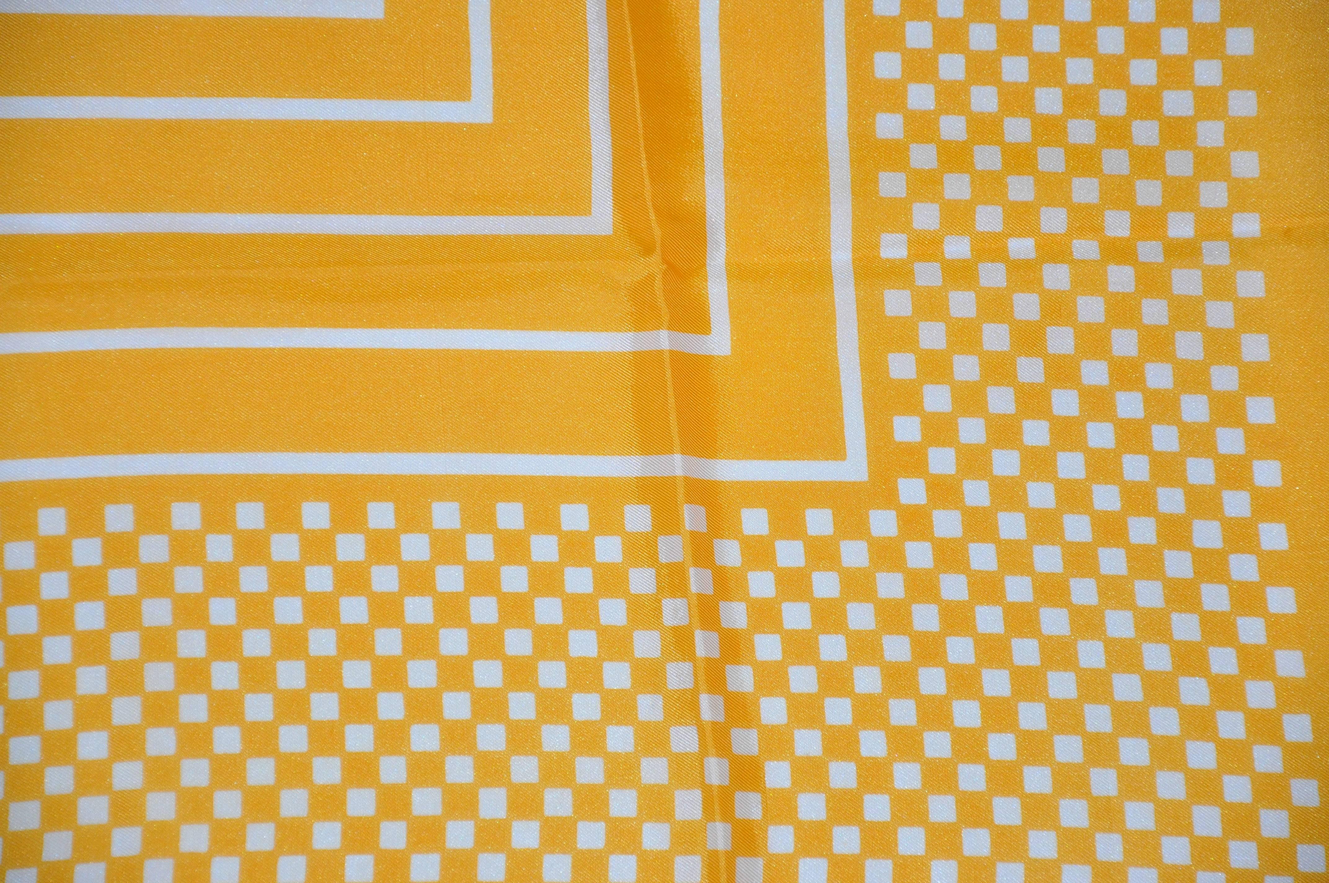 Bold yellow & white "Checkered & Stripes" scarf measures 26" x 26", finished with rolled edges. Made of acetate from Japan.