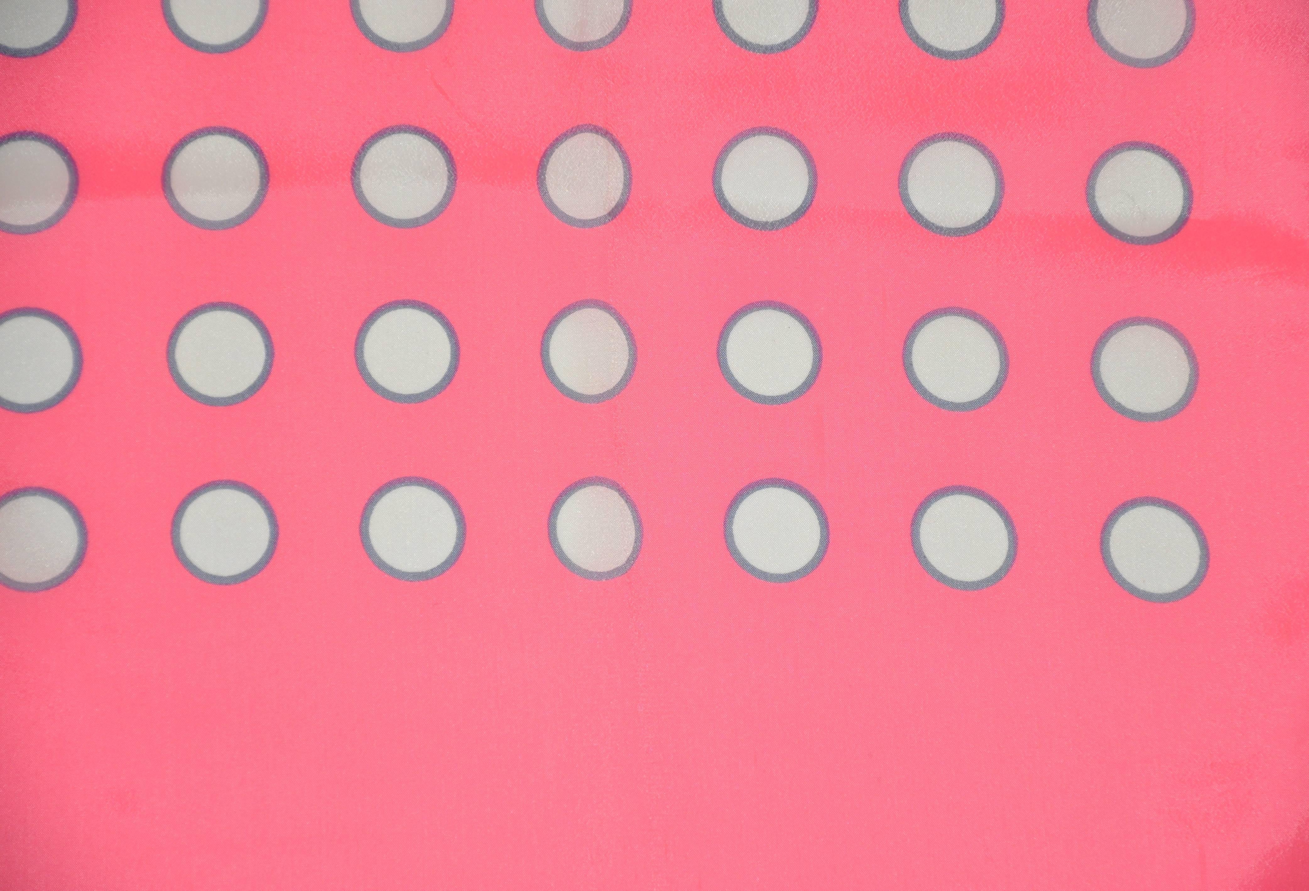 Neon fuchsia and white polka dot rectangle scarf measures 13