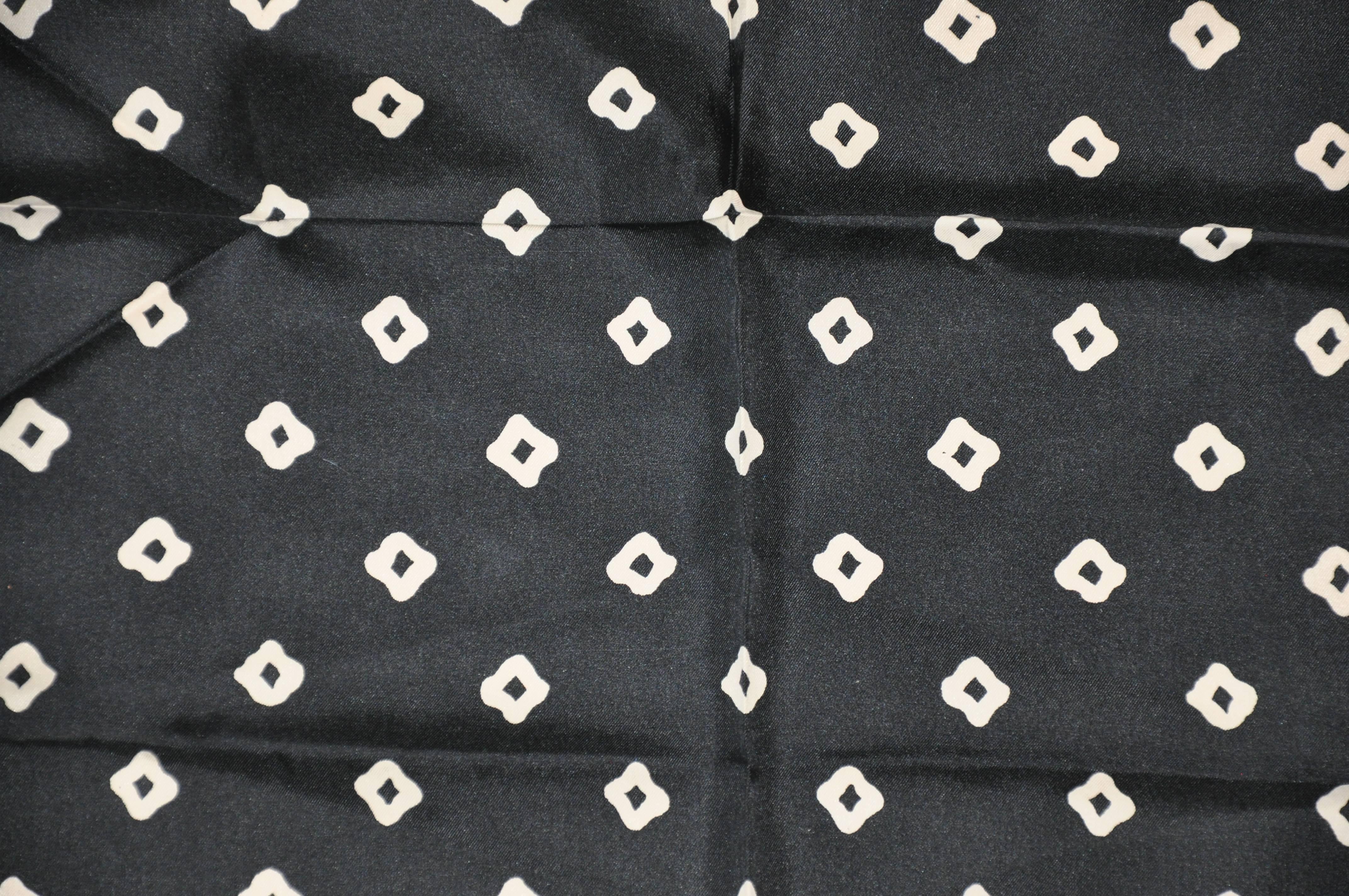 Black with beige accent silk men's handkerchief measures 19" x 19", finished with hand-rolled edges.