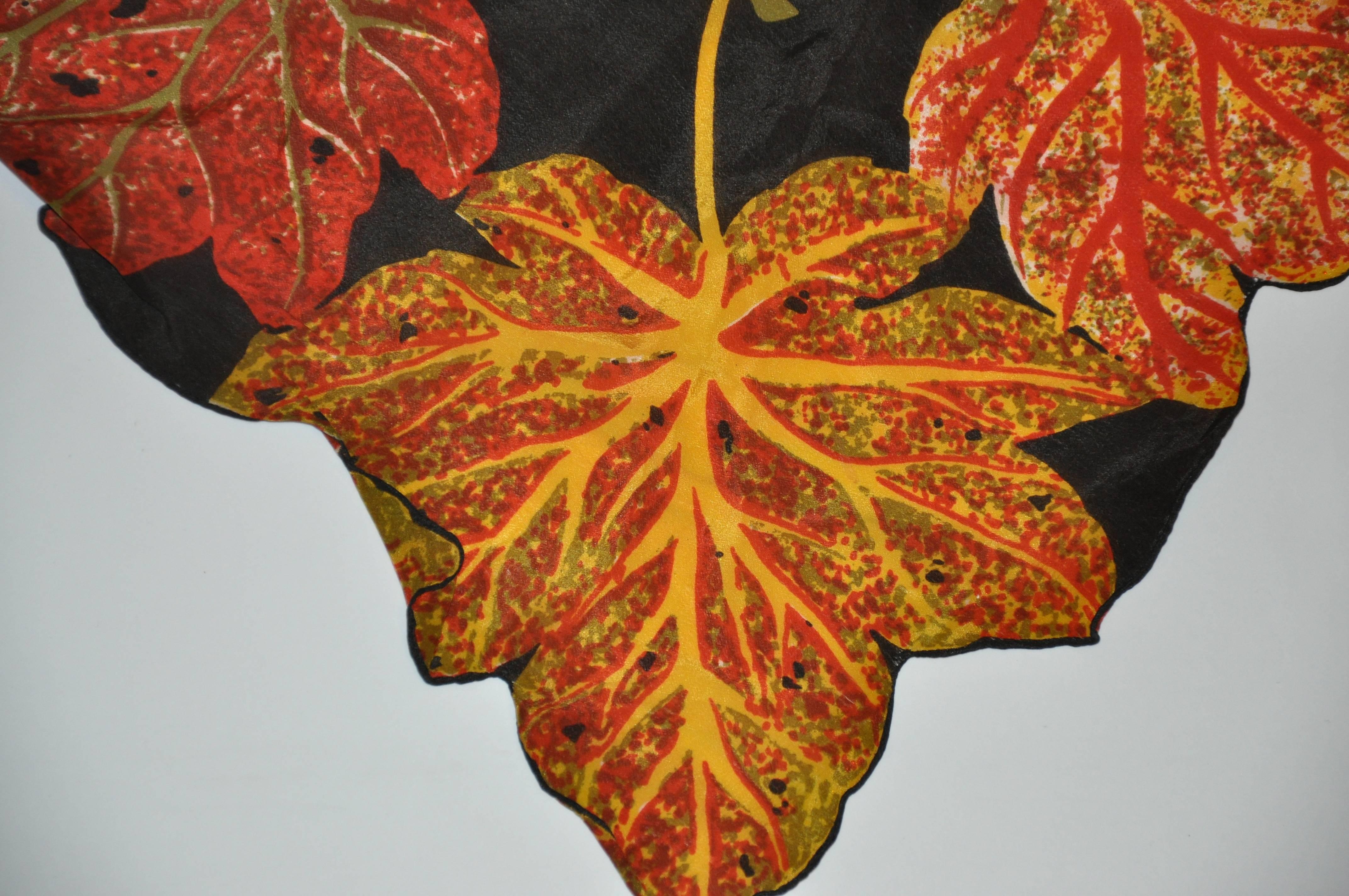 This rare wonderful double-panel "Autumn Leaves" silk scarf measures 17" x 40". Made in Japan.