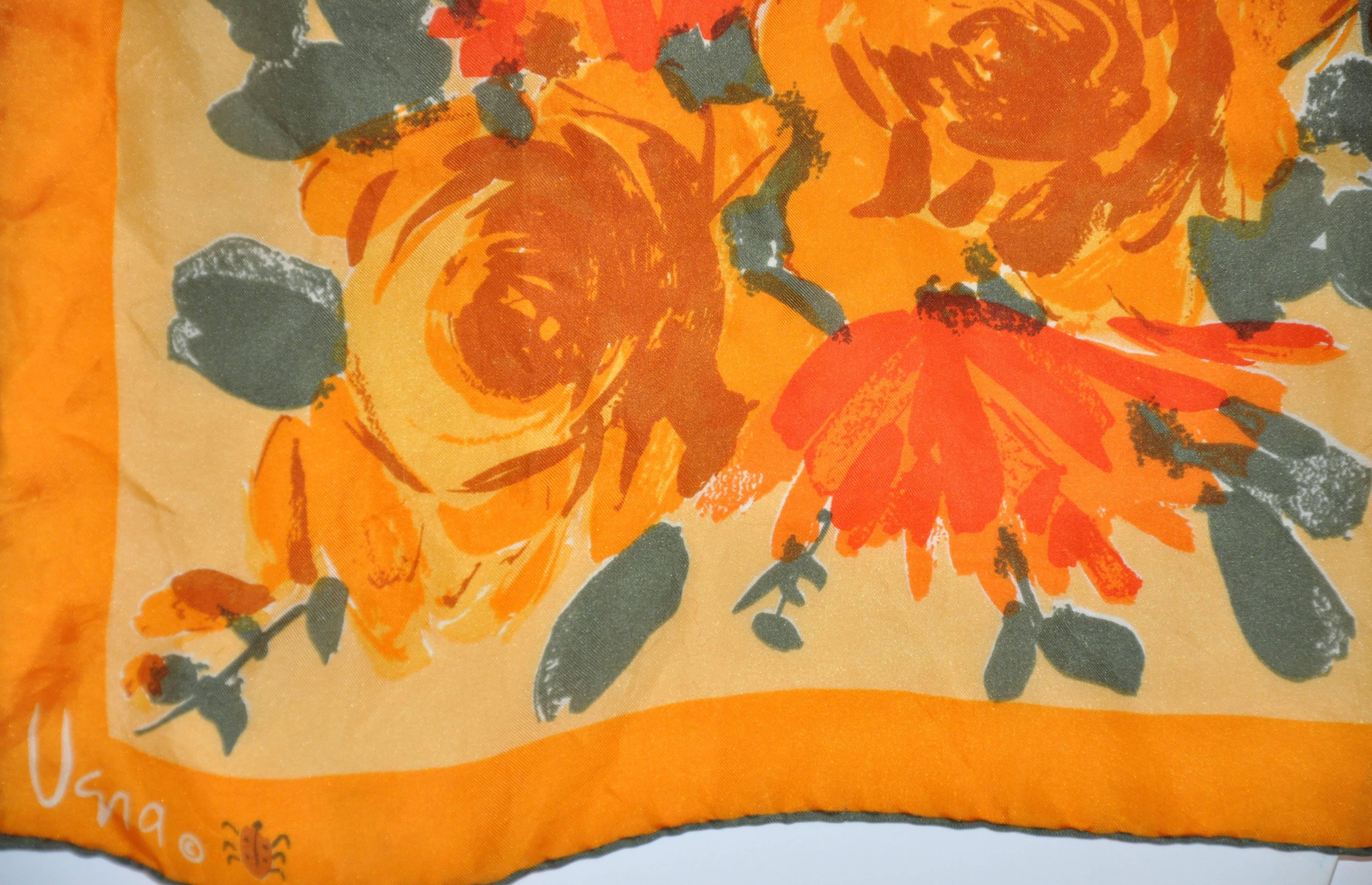 Vera wonderful "Burst of Tangerine & Orange Floral" Silk scarf is finished with hand-rolled edges. This wonderful scarf filled with warm shades measures 14" x 42", made in Japan.