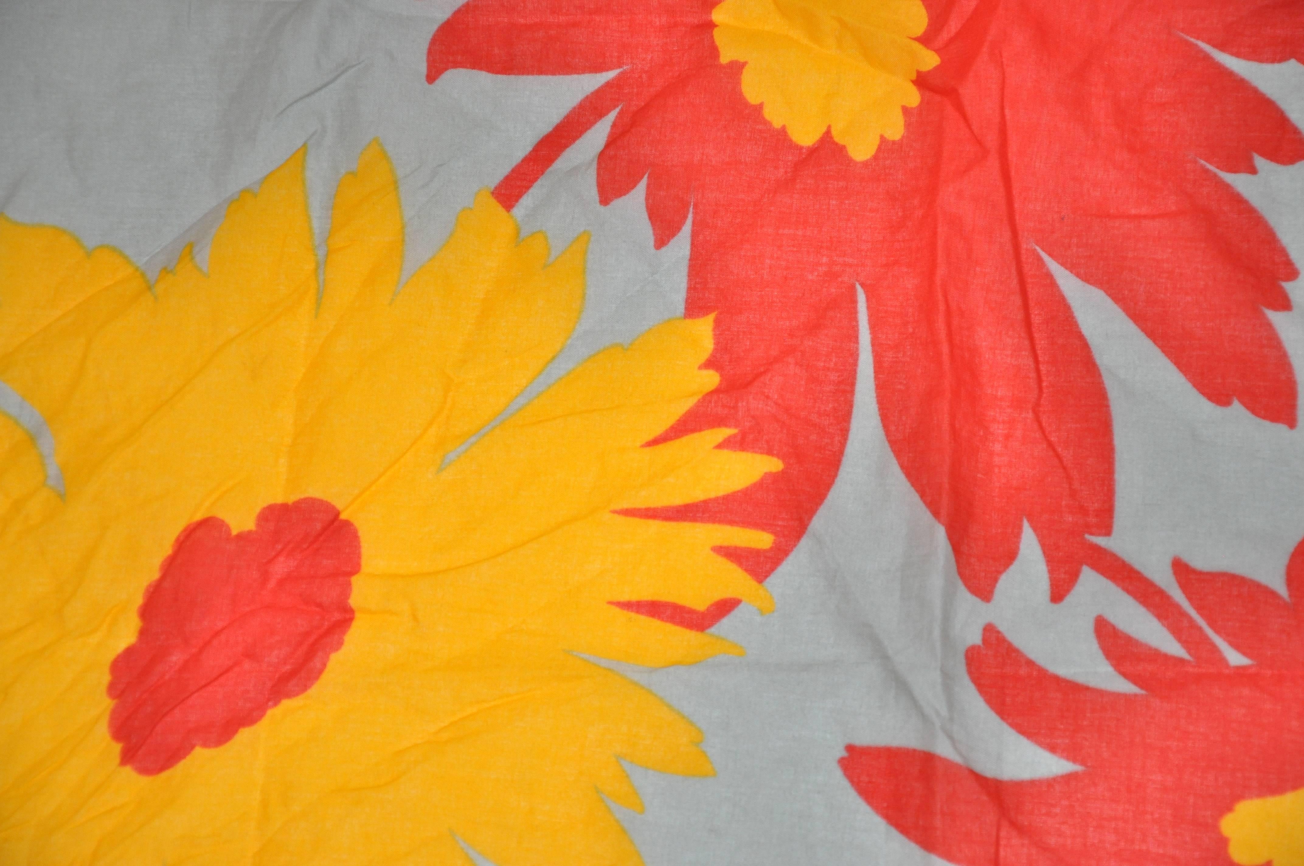 This wonderfully detailed large yellow & red floral accented with yellow border 100% cotton scarf from Italy measures 34