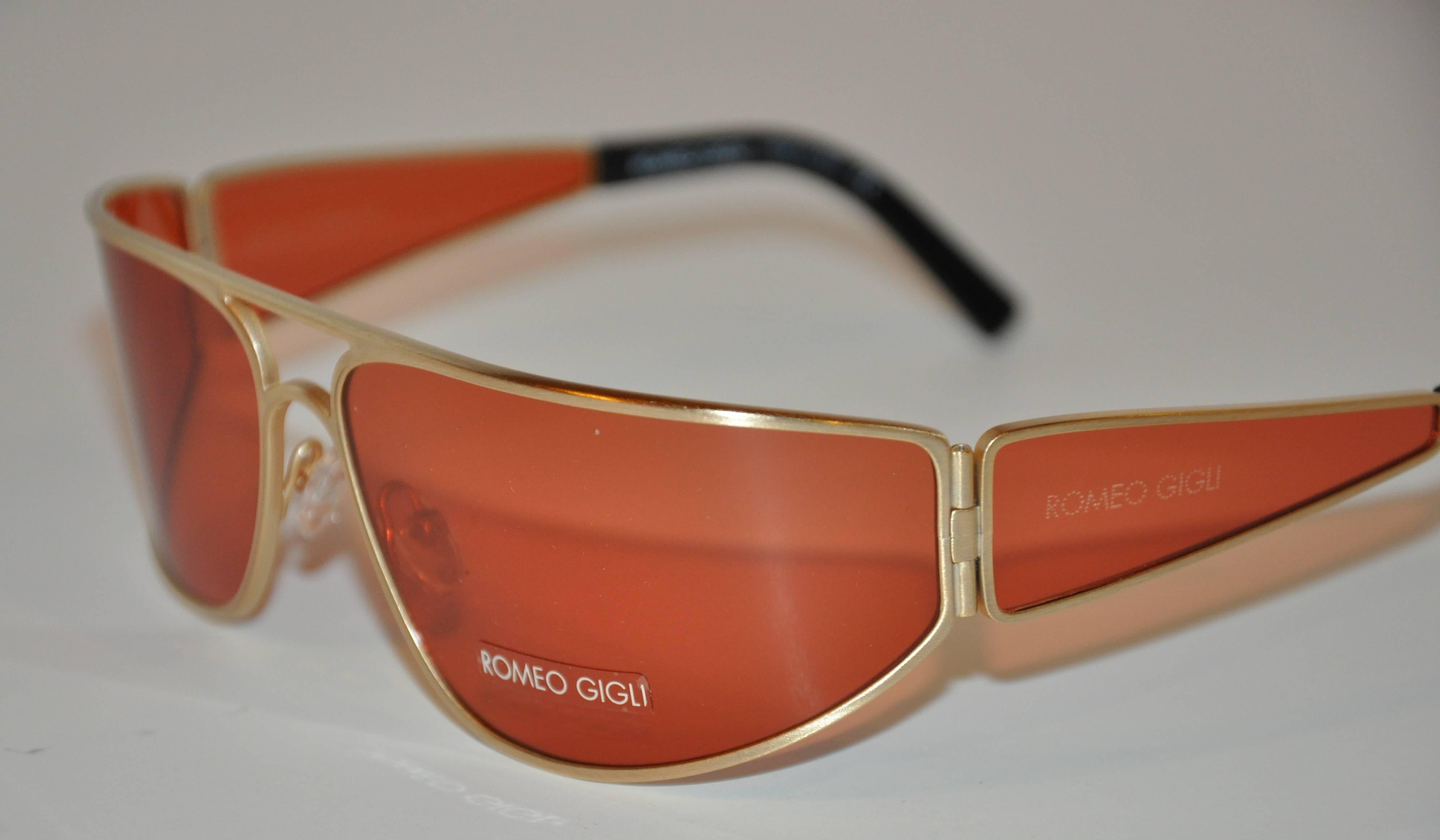 Romeo Gigli wonderful gold tone hardware wraparound sunglasses measures 6 1/4