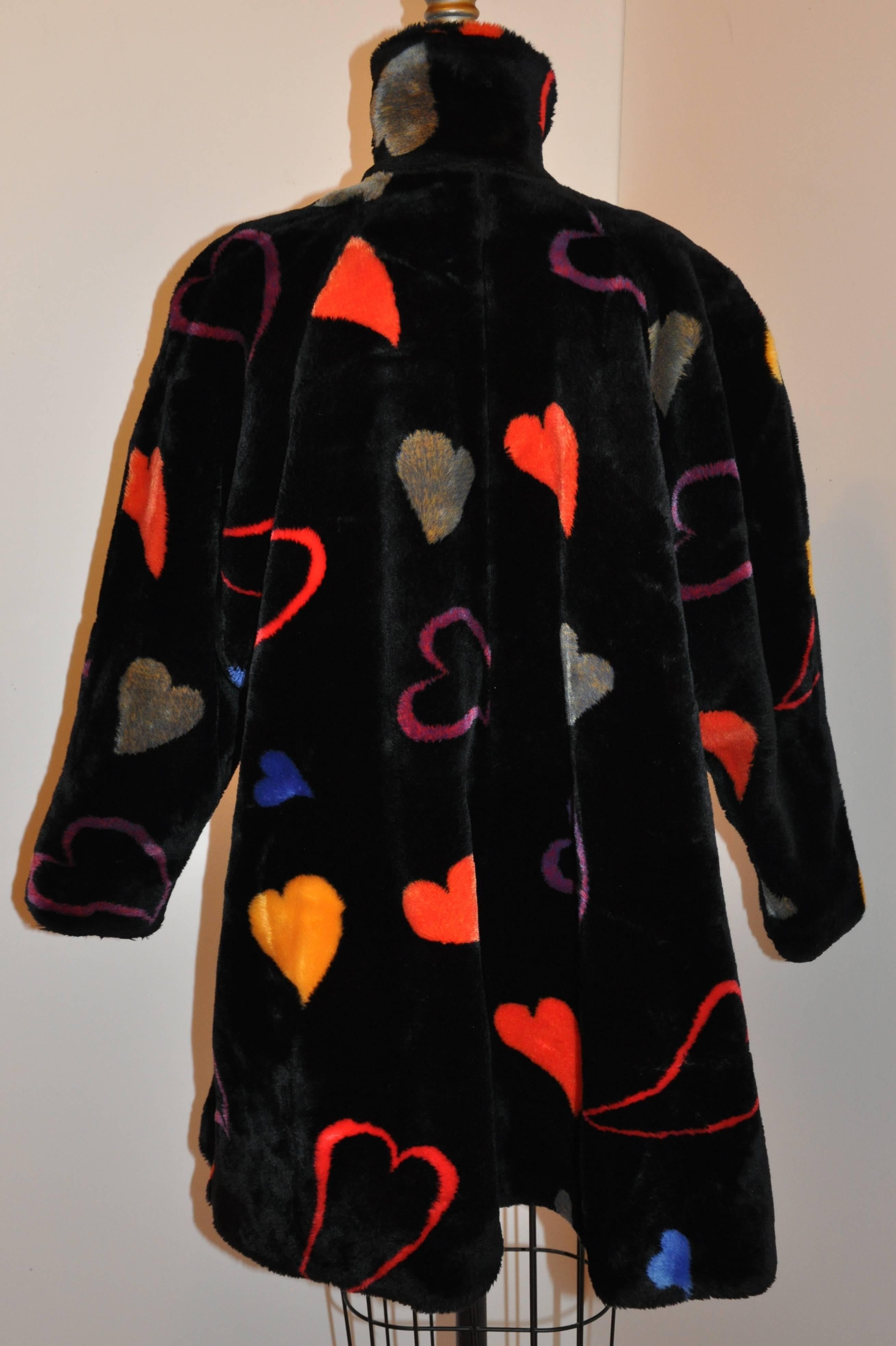 DonnyBrooks wonderful wicked bold abstract black faux fur swing jacket is accented with multi-colors of 
