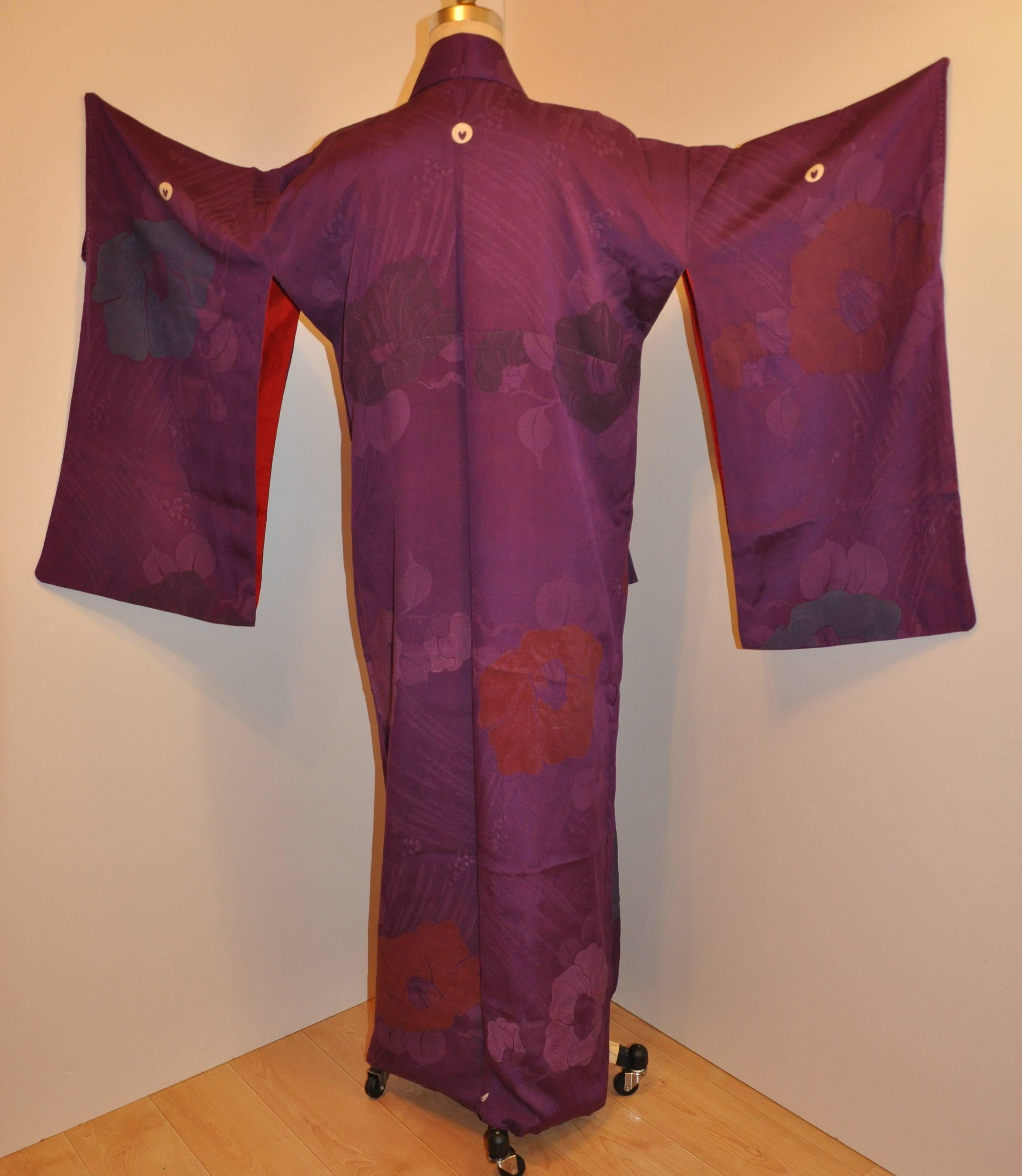      Elegant violet on violet textured silk highlighted with multi shades of floral kimono measures 57 1/2