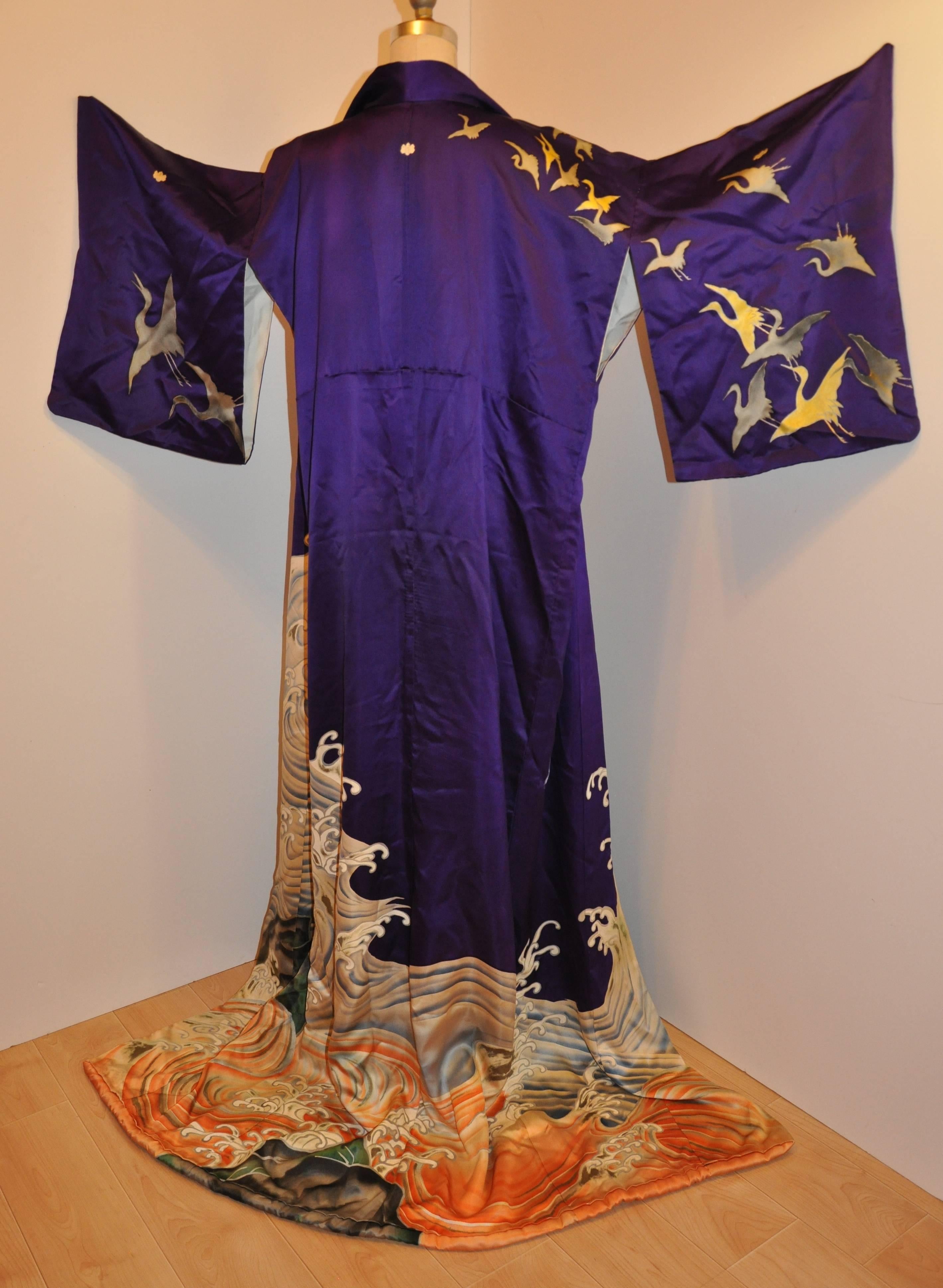      This wonderfully bold plum silk kimono features 