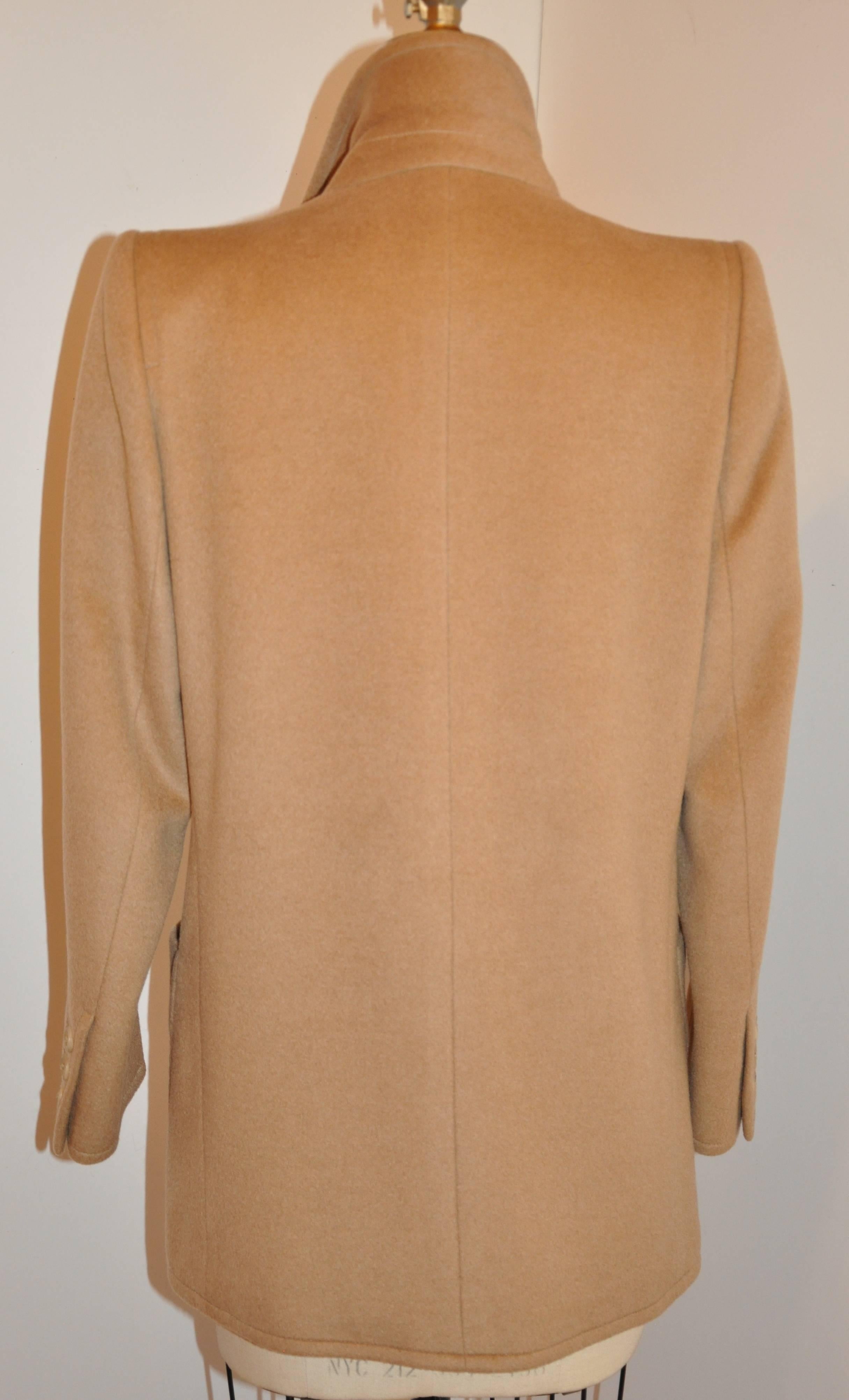      Yves Saint Laurent wonderfully timeless and simply elegant camel hair camel three-button front jacket with patch pockets measures 30 1/2