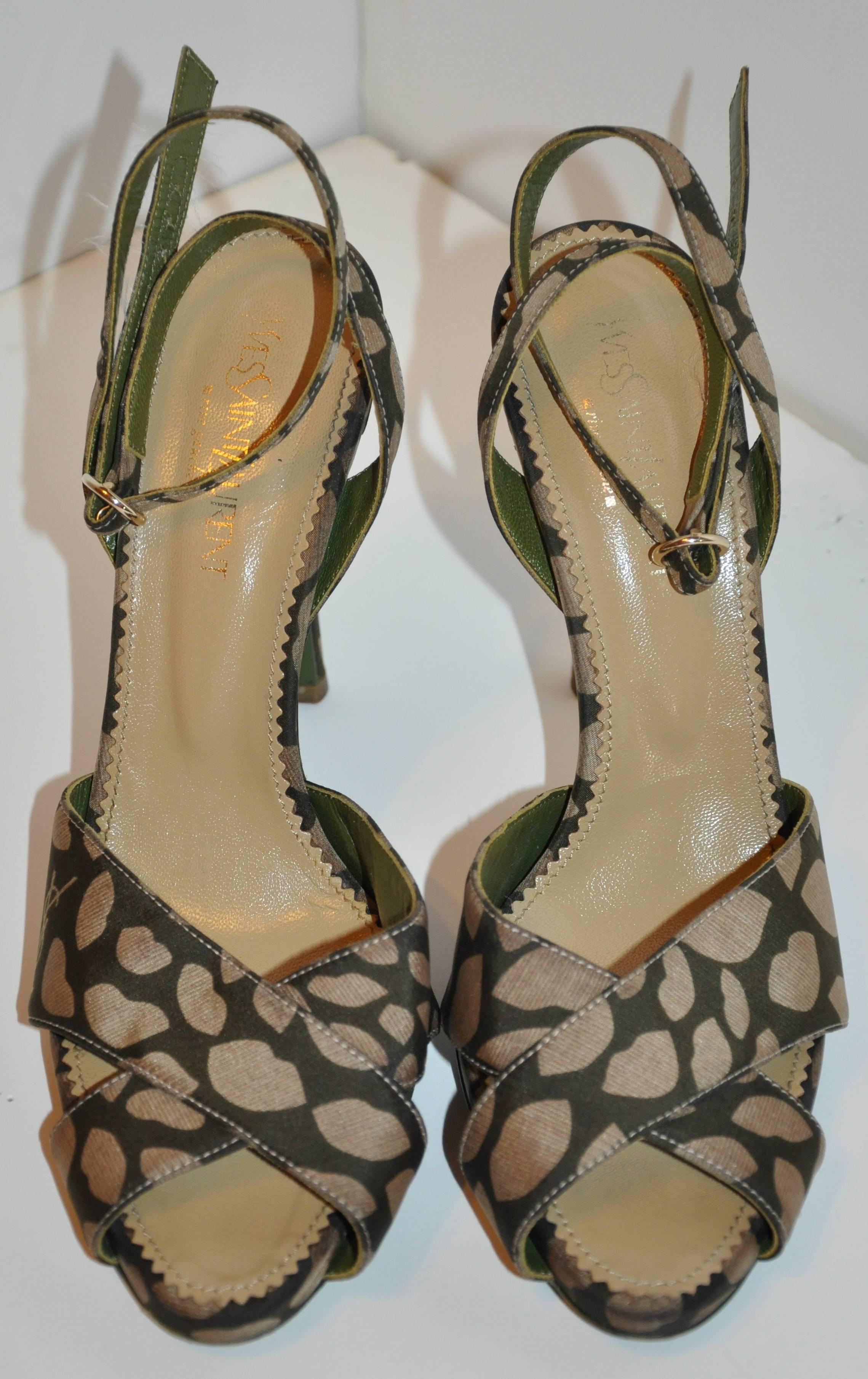        Yves Saint Laurent sexy, yet elegant olive Lips & Kisses ankle-strap sandals has adjustable ankle straps accented with a polished gold hardware buckle. slightly platformed in front measuring 1/2 inch in height. The back heel measures 4 1/2