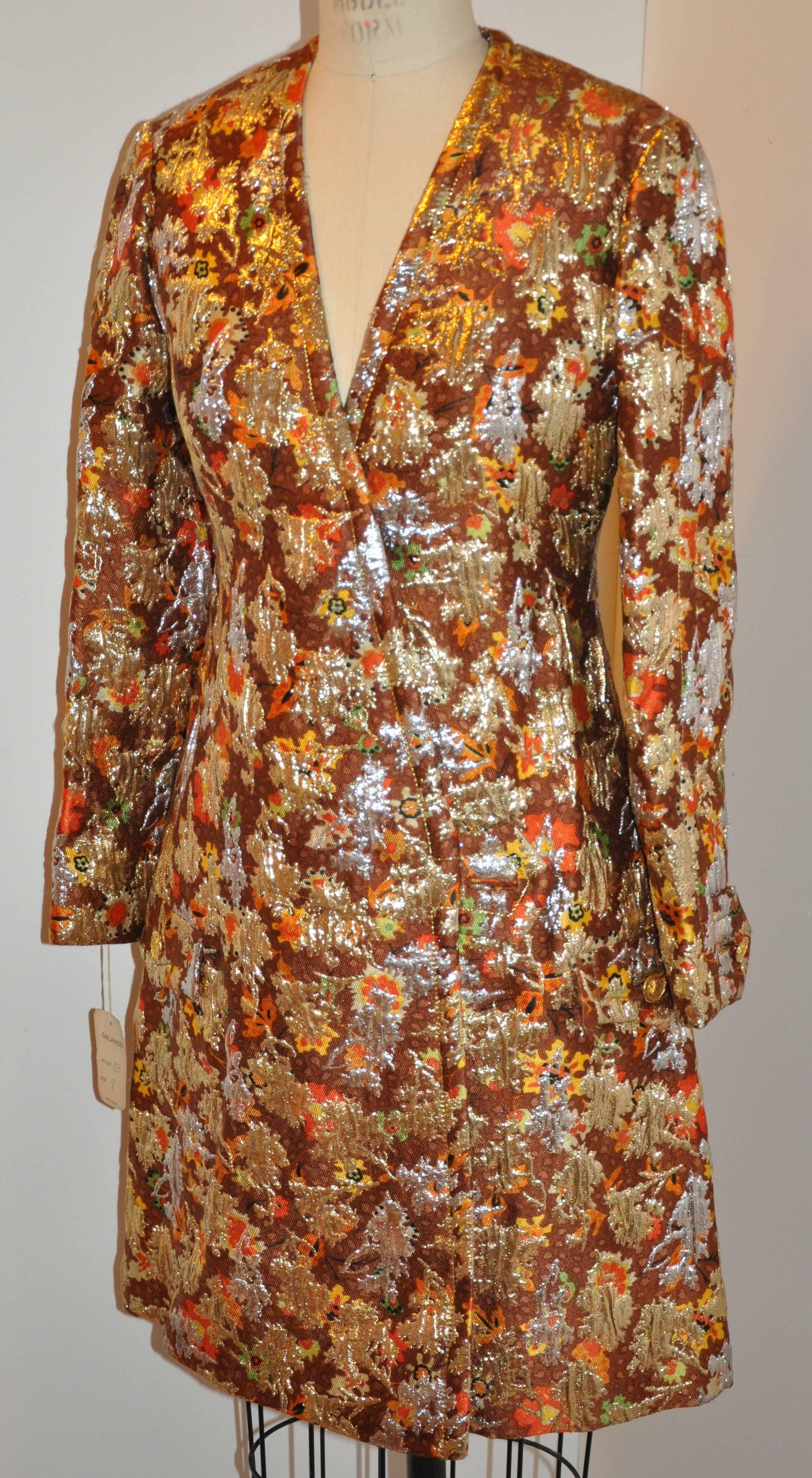        Galanos wonderfully elegant bold multi-color florals with metallic gold lame accent brocade evening coat is finished with a coco brown silk lining interior. A Runway sample, made of 52% wool, 28% rayon, 12% metallic threads, and 8% silk on