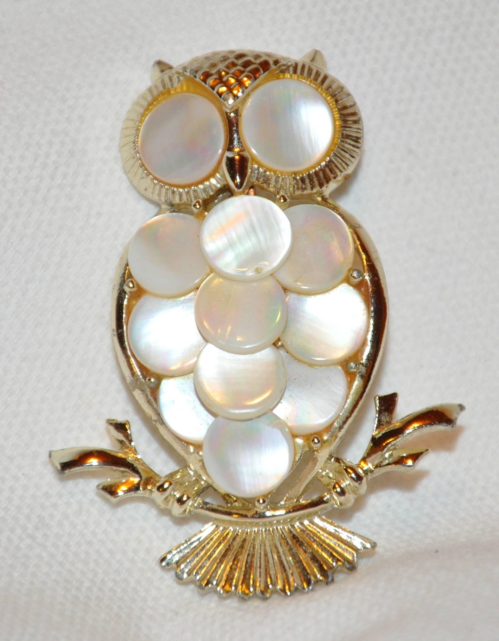       This wonderfully detailed "Owl" set in gilded gold vermeil hardware is accented with mother-of-pearl. The brooch measures 2" x 1 1/2", made in United States.