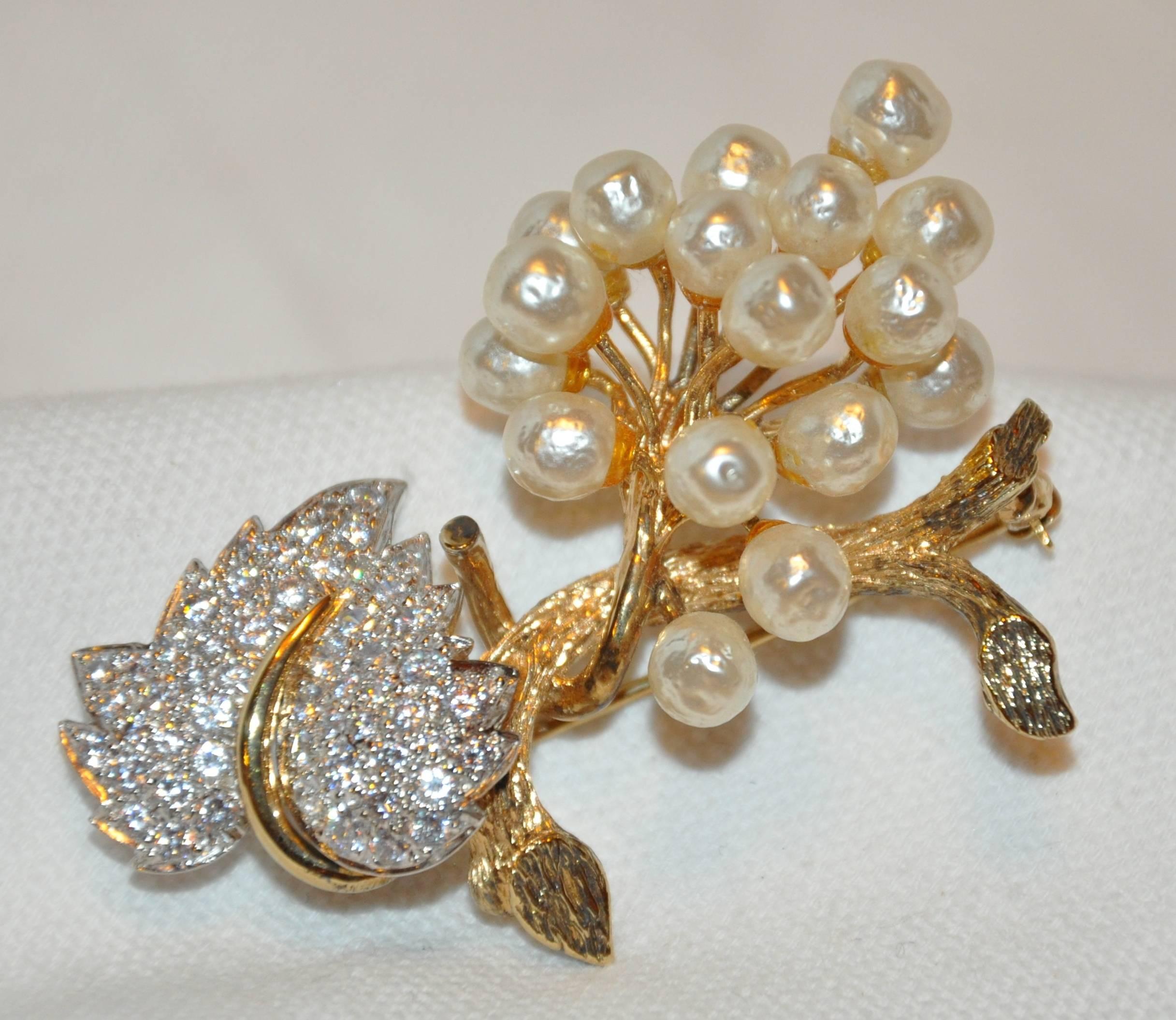        This wonderfully detail "Floral & Leaves" brooch set with brilliant and stunning cut faux diamonds accented with faux pearls in polished gilded gold vermeil hardware measures 2 1/4" in length and 1 1/2" in width, depth