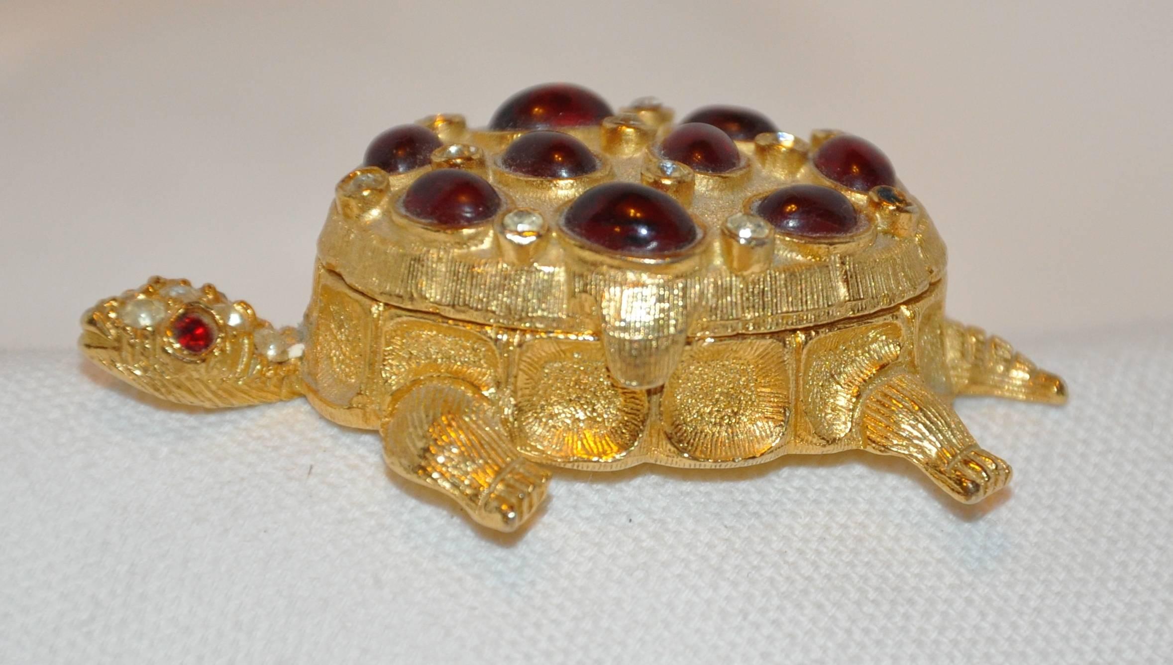        This wonderfully whimsical gilded gold vermeil finished "Turtle" pill box is accompanied with a micro thongs inside to use to pick the pills out instead of using your own fingers. The exterior is wonderfully accented with detailed
