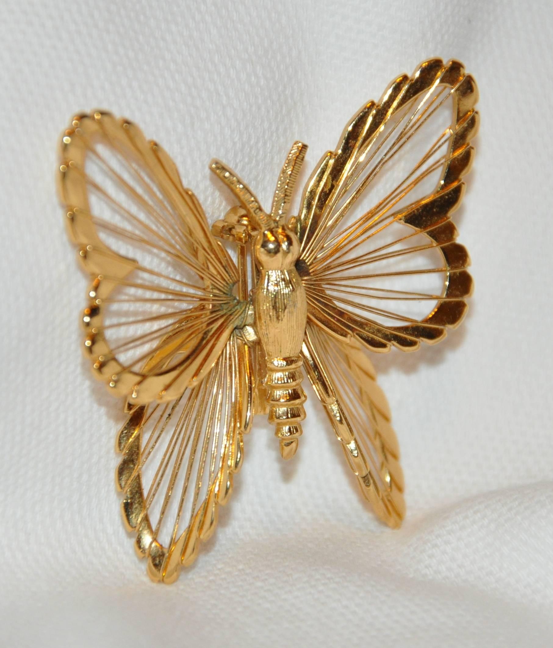       Monet wonderfully detailed gilded gold vermeil hardware "Butterfly" brooch measures 1 6/8 inches, width is 1 6/8 inches, depth is 1/2 inch, made in US.