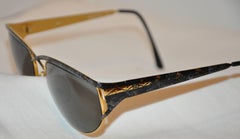 Laura Biagiotti Schwarz-goldene „Confetti“-Gläser in Schwarz- und Goldtönen über Goldbeschlägen