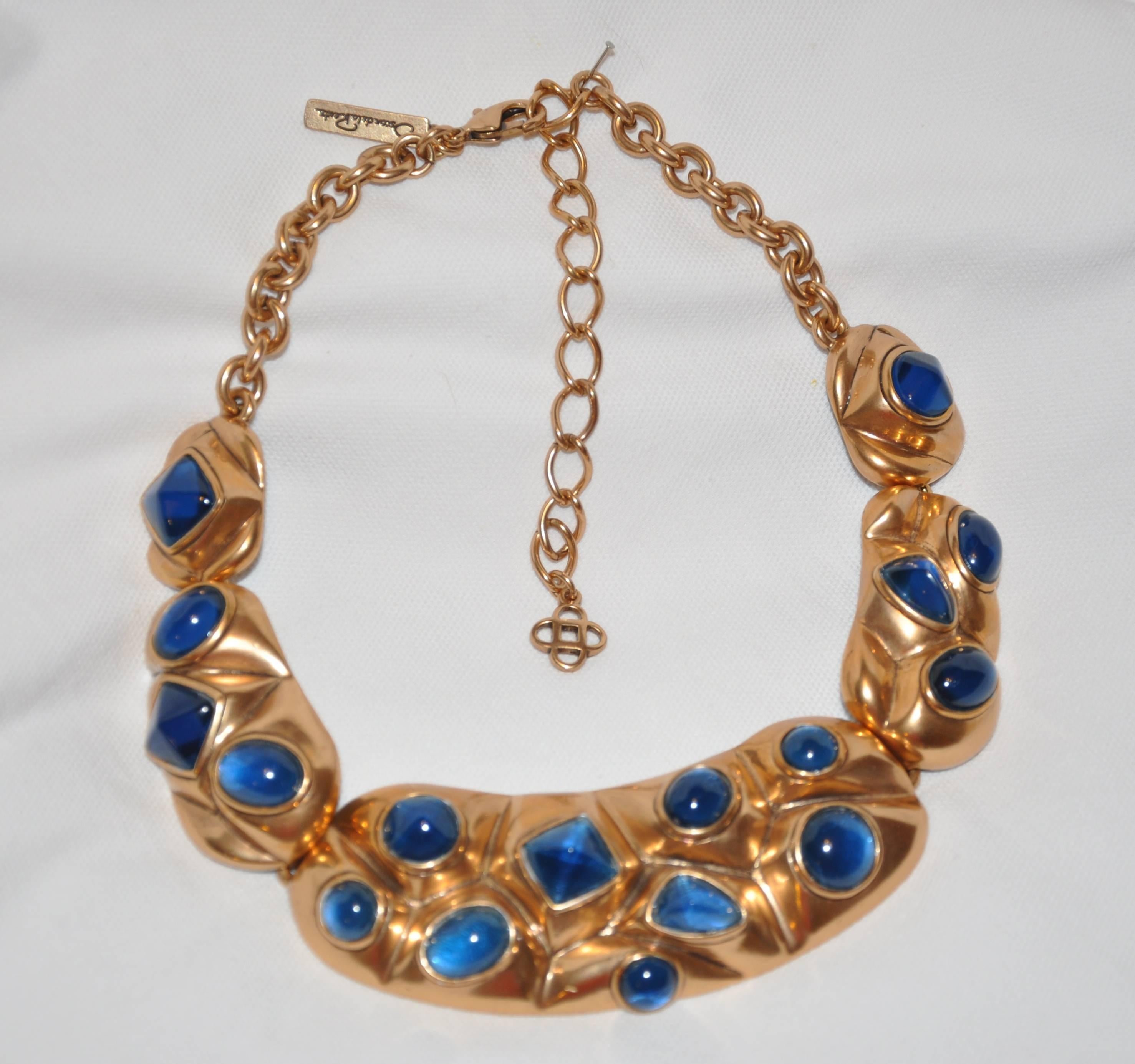        Oscar de la Renta magnificent adjustable necklace with matching cuff bracelet is wonderfully detailed with polished gilded gold vermeil hardware set with multi-size pour glass. The adjustable necklace measures from 17 1/2 inches  to 21