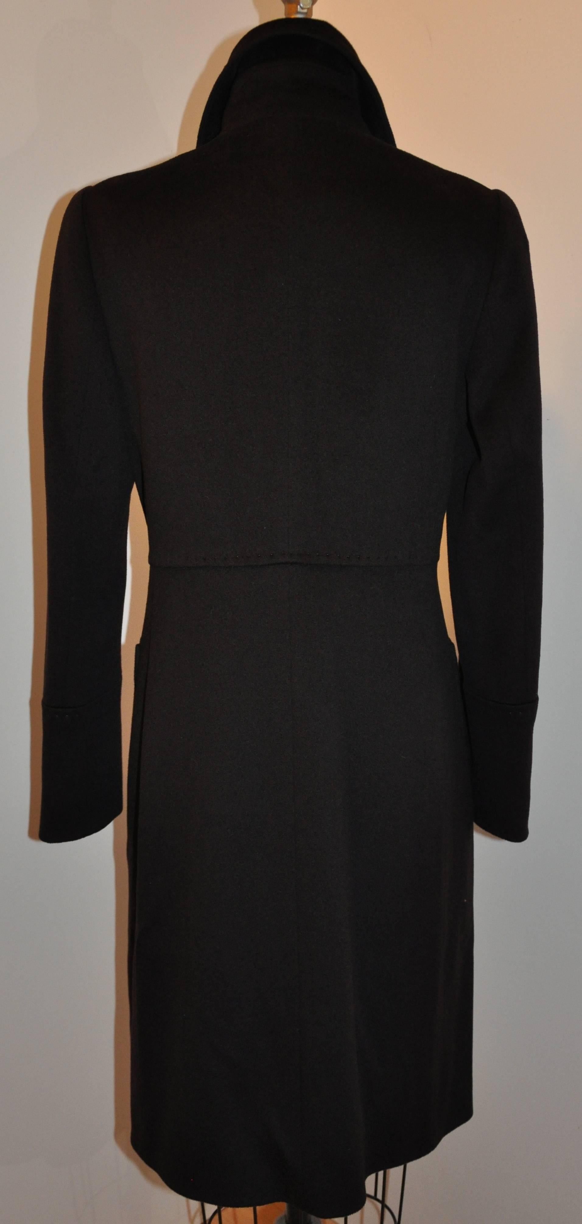        Cinzia Rocca wonderfully elegant coco brown button coat made with the famed Loro Piano's super fine wool features two front patch pocket as well as hand-sewn detailed top-stitching throughout this wonderful coat. The length measures 40