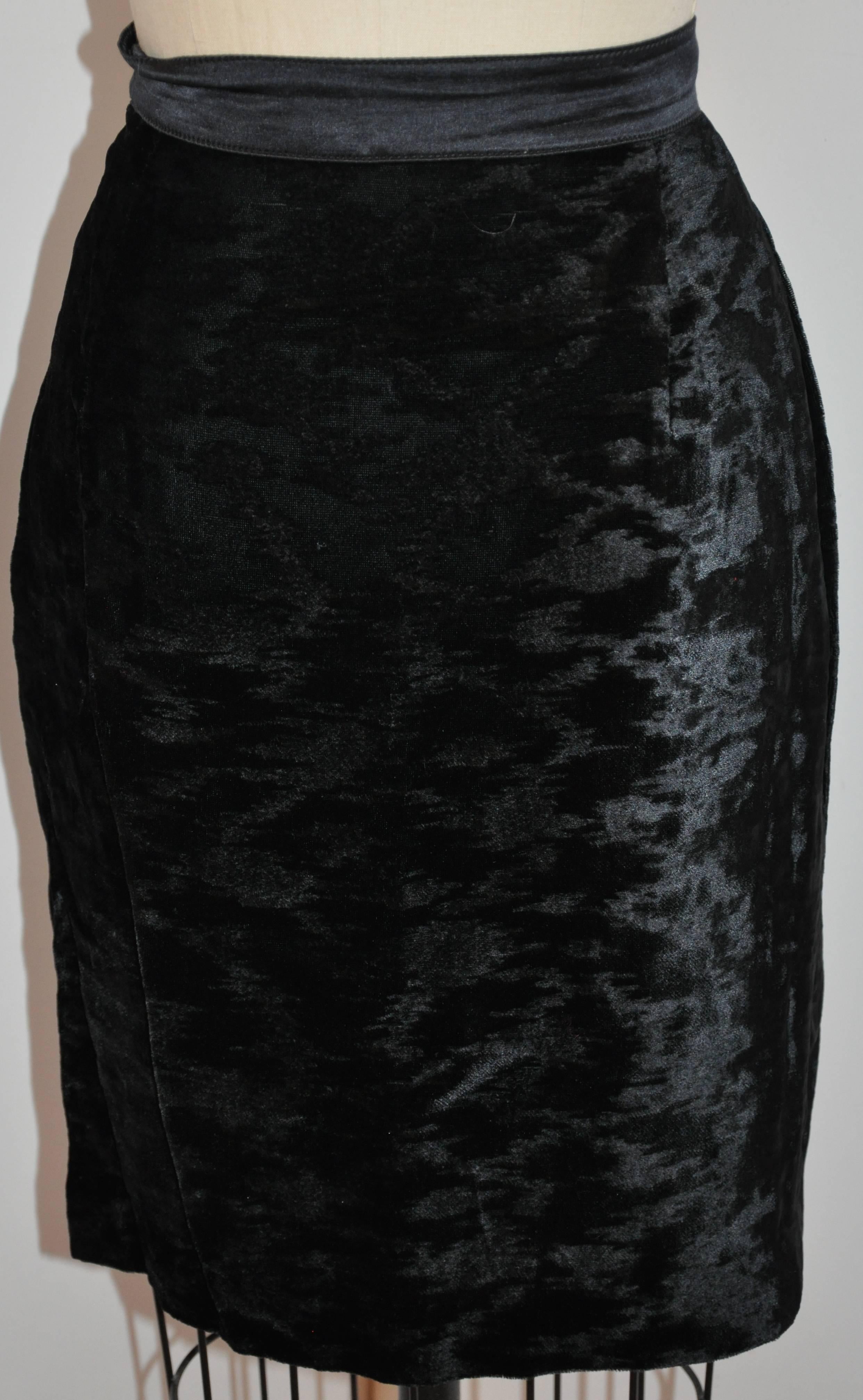      Escada by Margaretha Ley elegant fully lined jet-black fully lined crushed velvet pencil skirt is accented with a silk-satin waistband. The invisible side zipper measures 7 1/4 inches in length. The waistband measures 1 1/2 inches, waist