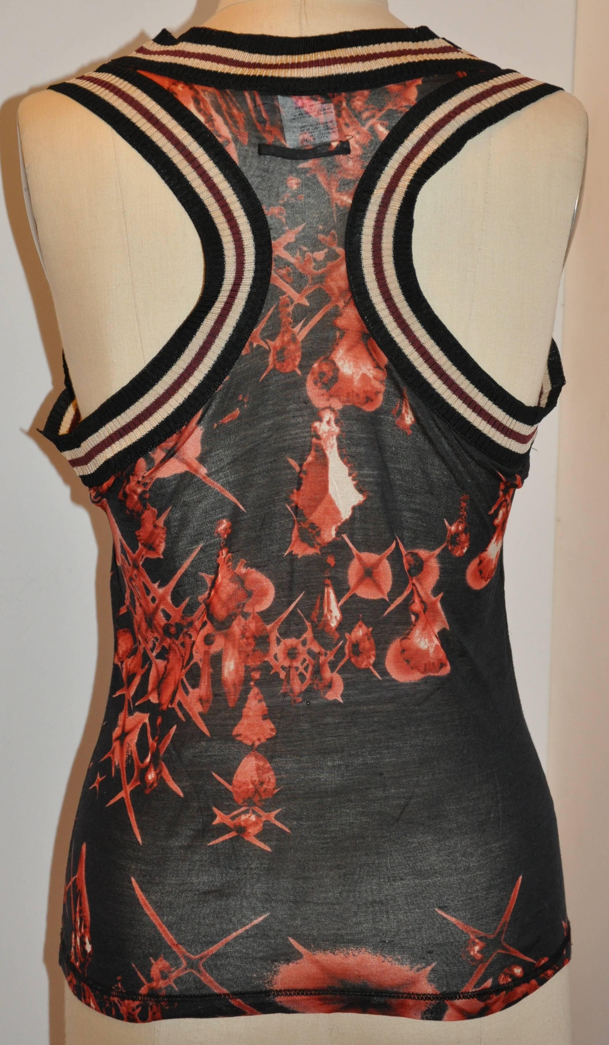        Jean Paul Gaultier's wonderful stretch Femme Malle Red and Black Racer's back top is detailed with a combination of black, cream, and burgundy stripe borders. the tank top wonderfully give a body-hugging fit where needed. The length measures