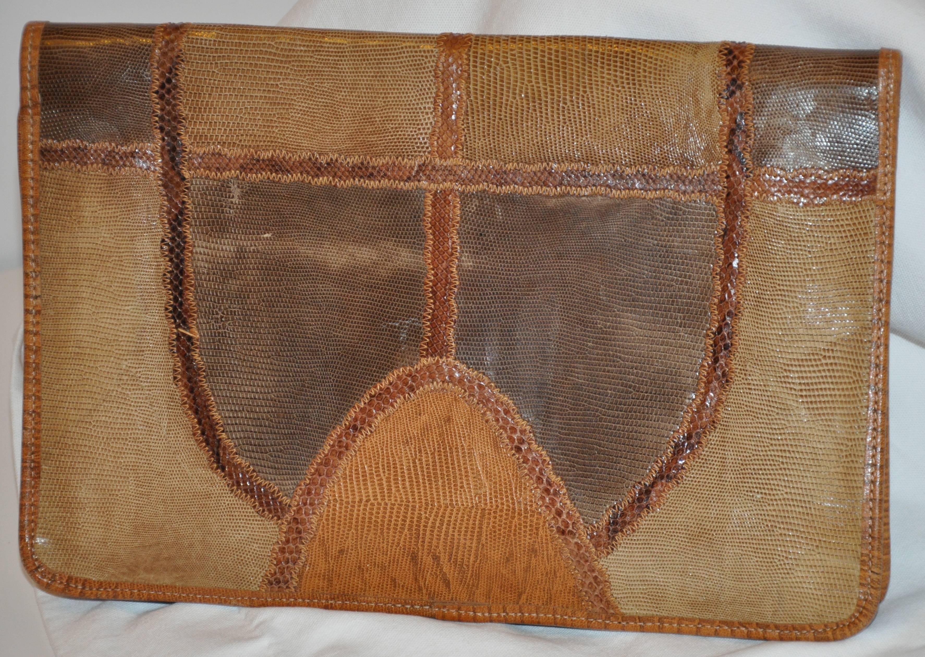        Carlos Falchi Signature multi "shades of browns" multi skins such as snake and lizard makes for a wonderful clutch. The sides are finished with embossed calfskin for better wear and durably well as all finished edges. Top stitching