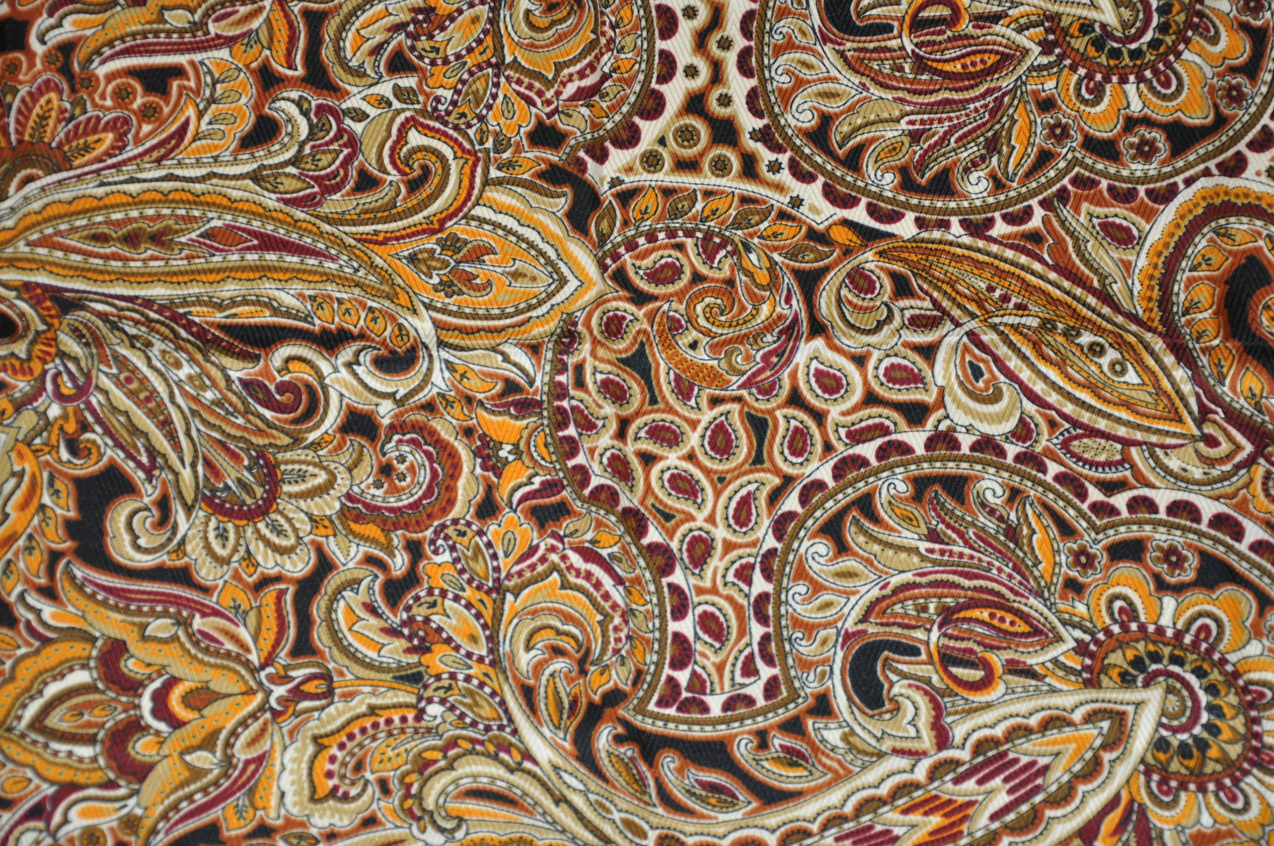        Baar & Beards wonderfully elegant textured silk with ivory borders surrounding multi-colors of 