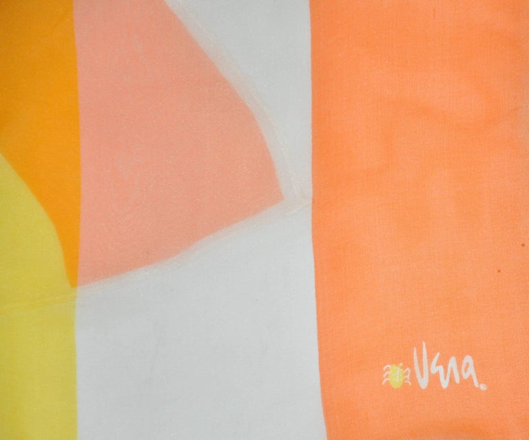        Vera wonderful combination of tangerines, yellows and white in this chiffon scarf with rolled edges, measures 17 inches by 65 inches. Made in Japan.