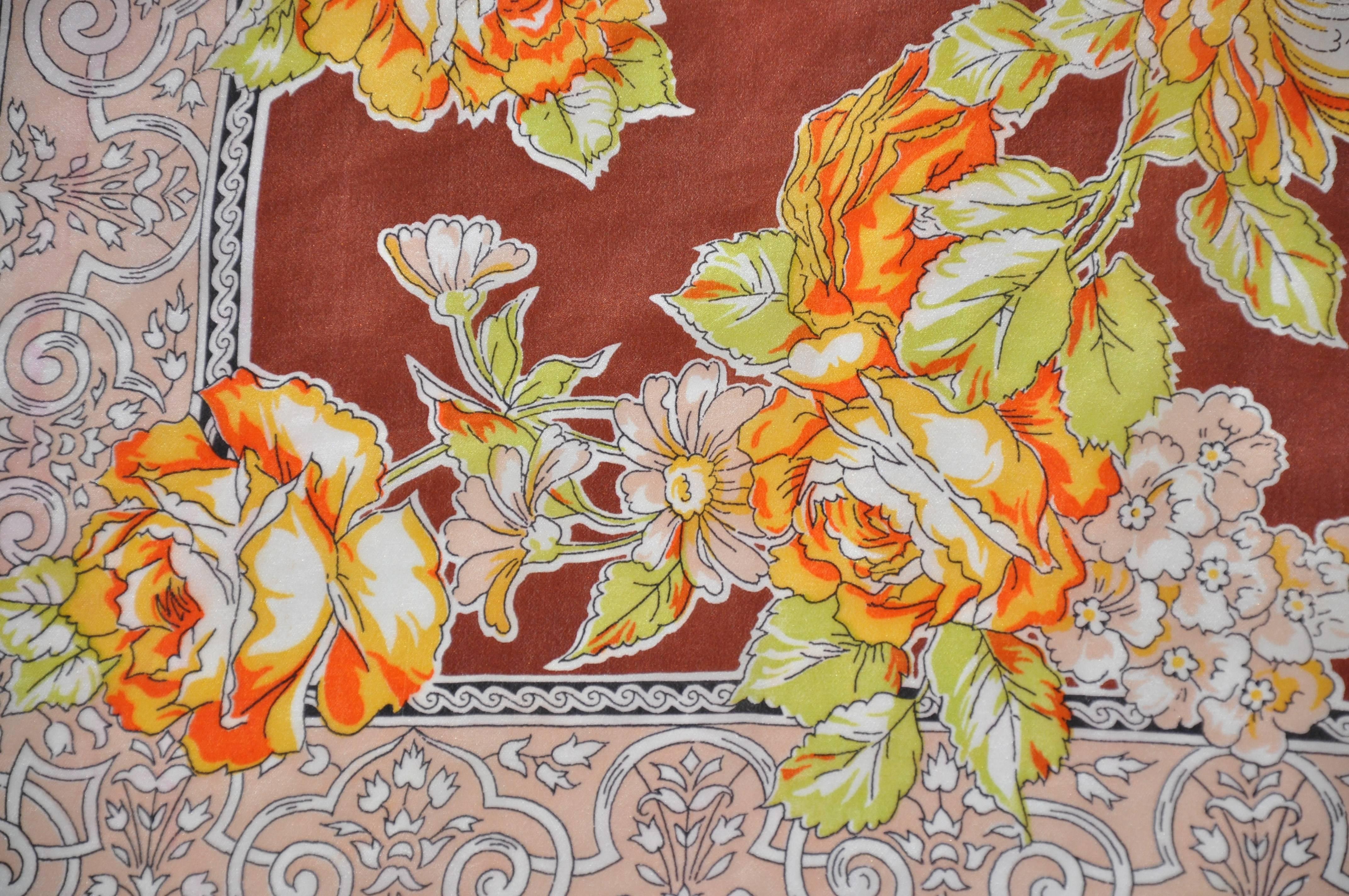        This wonderful Bursting shades of tangerine and yellow floral surrounded with warm brown border silk scarf accented with hand-rolled edges, measures 34 inches by 35 inches. Made in Italy.