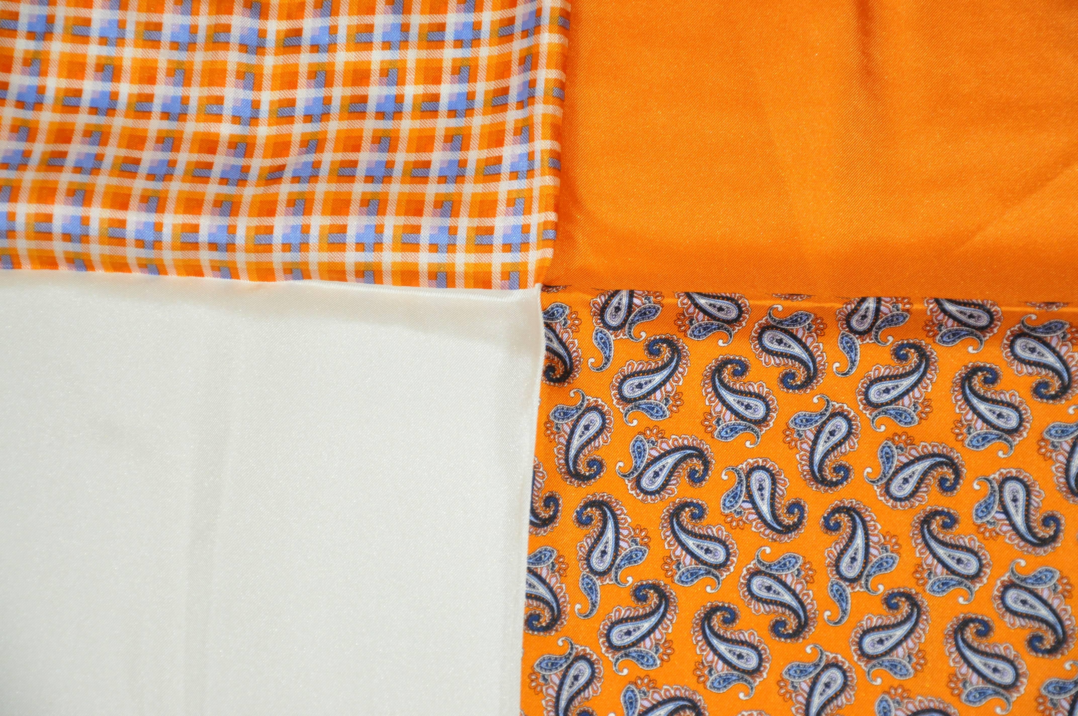        Magnifiques nuances chaudes de tangerine palsey, plaid, rayures ainsi que mouchoir en soie solide accentué avec des bords roulés à la main, mesure 16 pouces par 16 1/2 pouces. Fabriquées en Italie.
