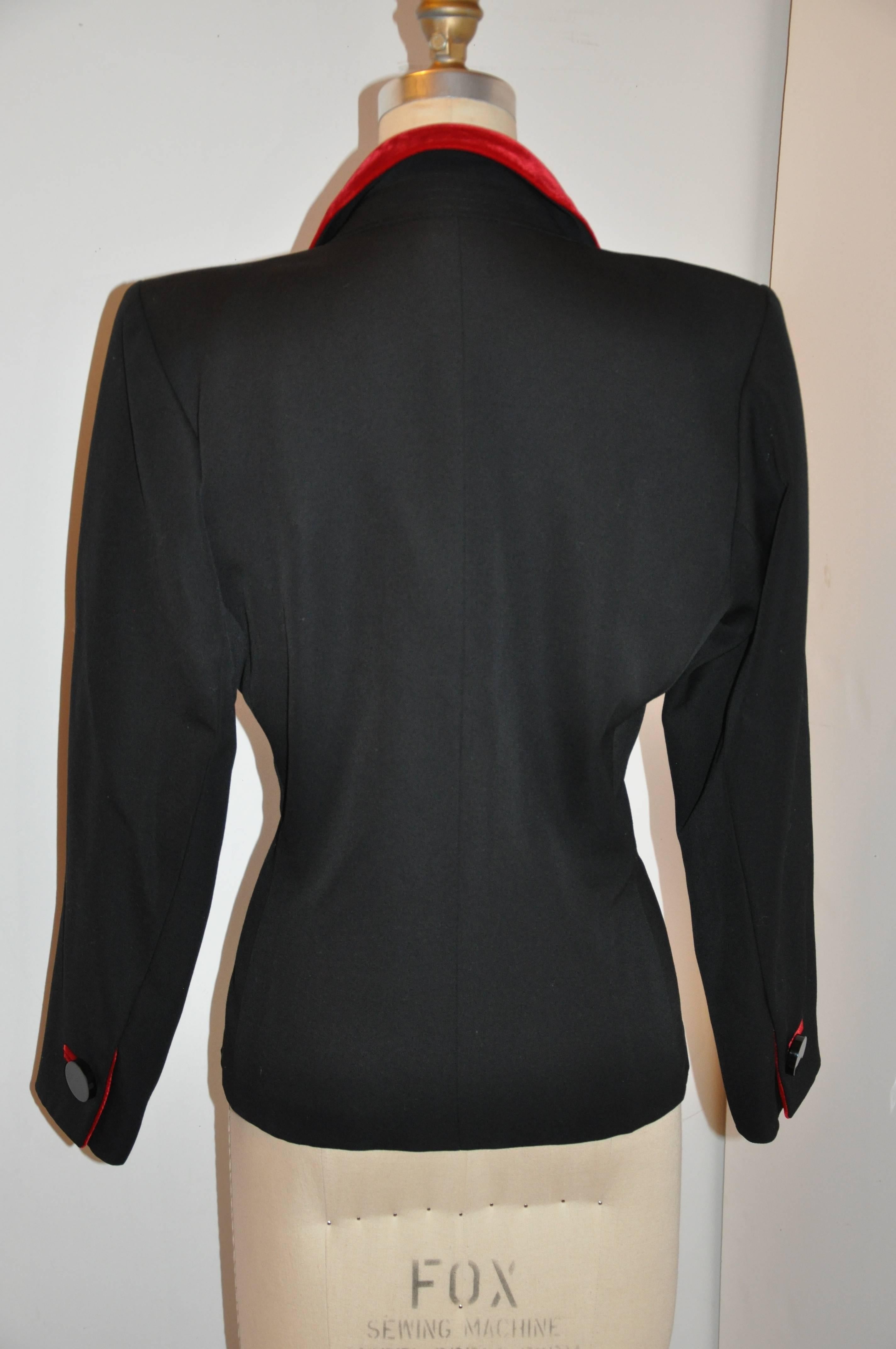        Yves Saint Laurent wonderfully elegant signature black wool accented with red velvet throughout 