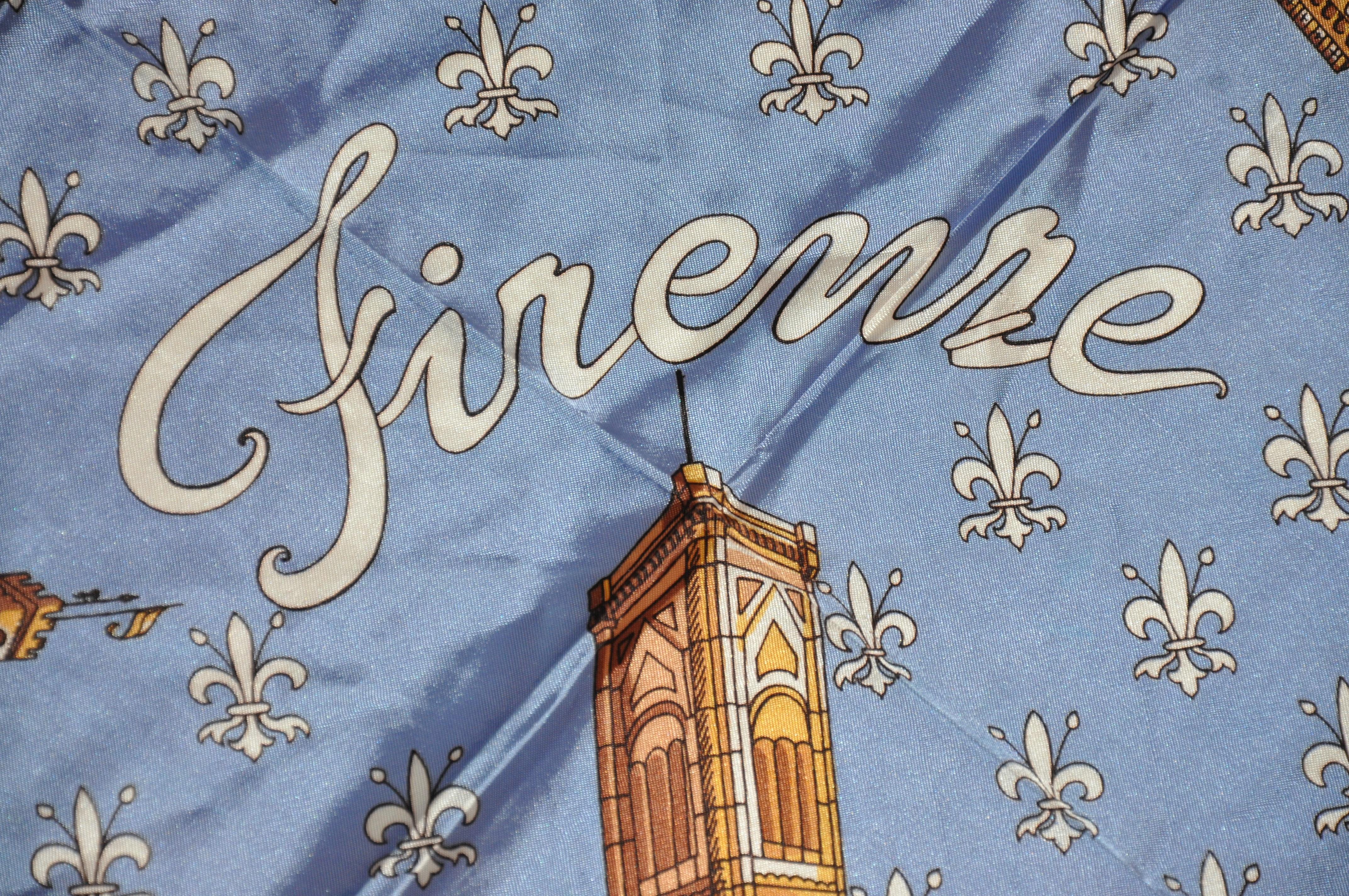      Firenne Fleur de Lis sky-blue acetate scarf with fleur de lis beautifully scattered throughout, measures 26 inches by 27 inches. Made in Italy.