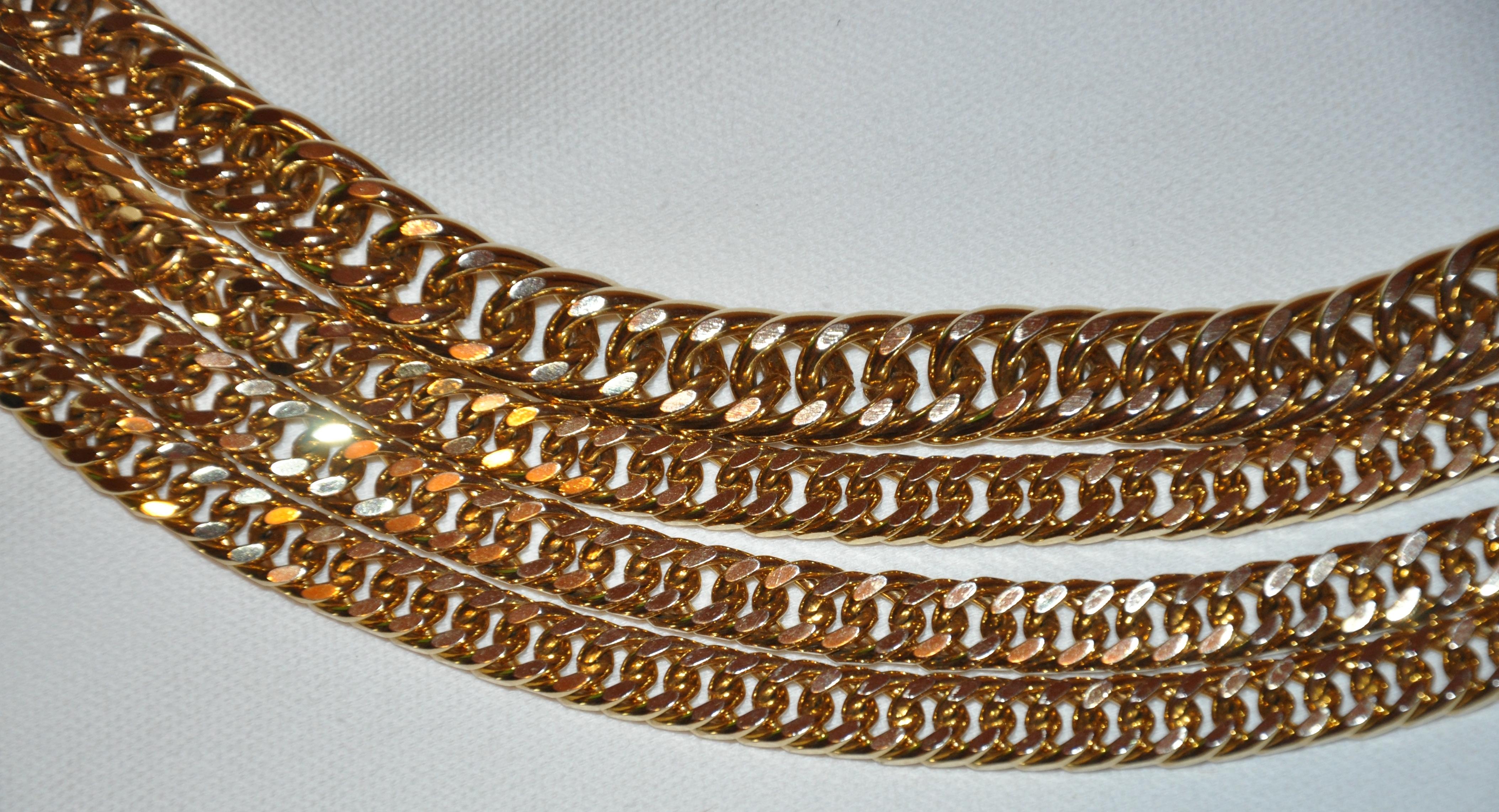        This wonderfully elegant and timeless thick polished gilded gold vermeil hardware adjustable chain belt, has 4-tiers of chain elegantly draping when worn. The w

