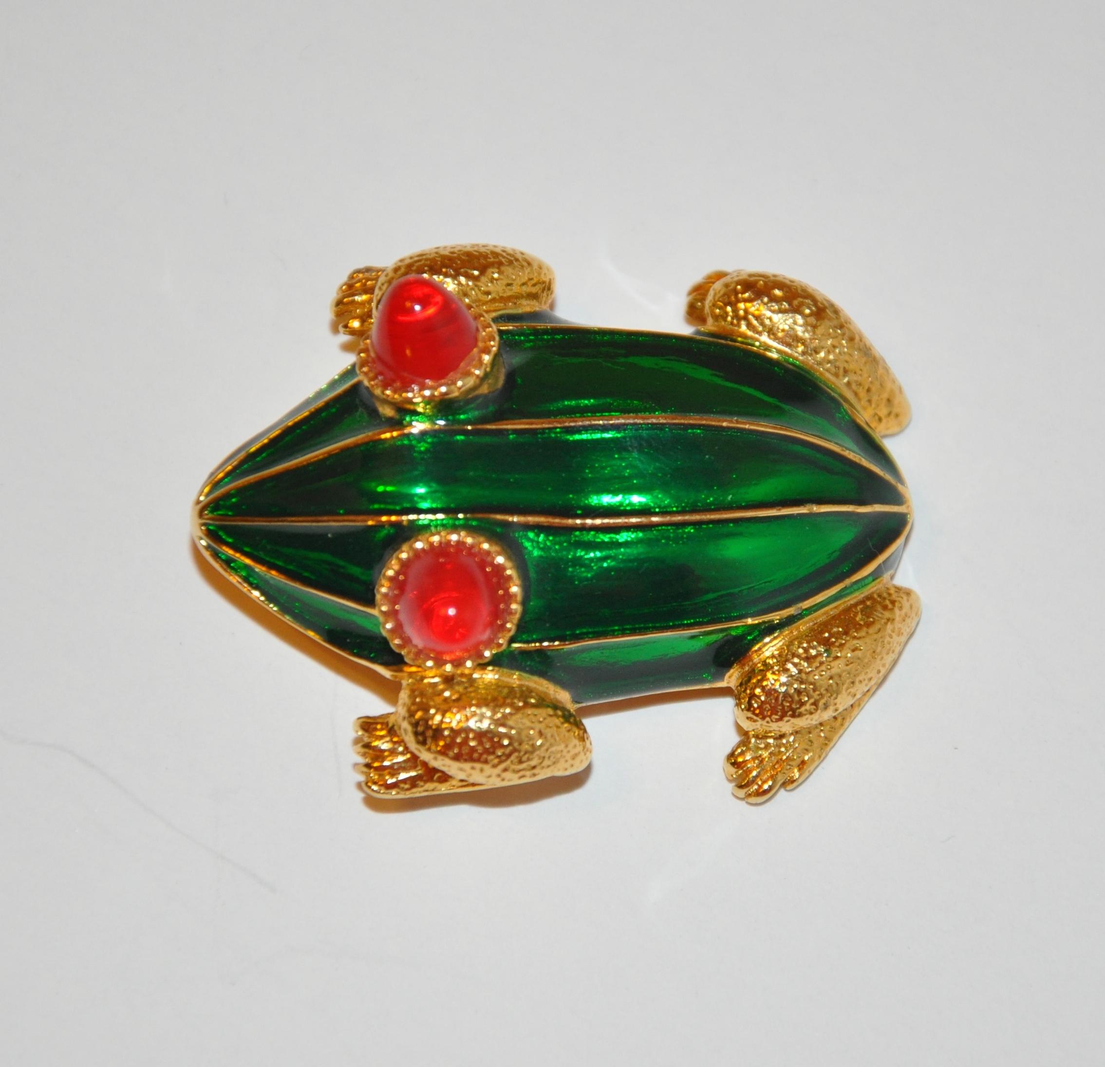        Kenneth Lane rare wonderfully vivid whimsical gilded gold vermeil hardware with Irish-Green overlay enamel accented with ruby-like eyes. Surrounding the eyes are micro studs. The length measures 1 7/8 inches. The width measures 1 3/8 inches,