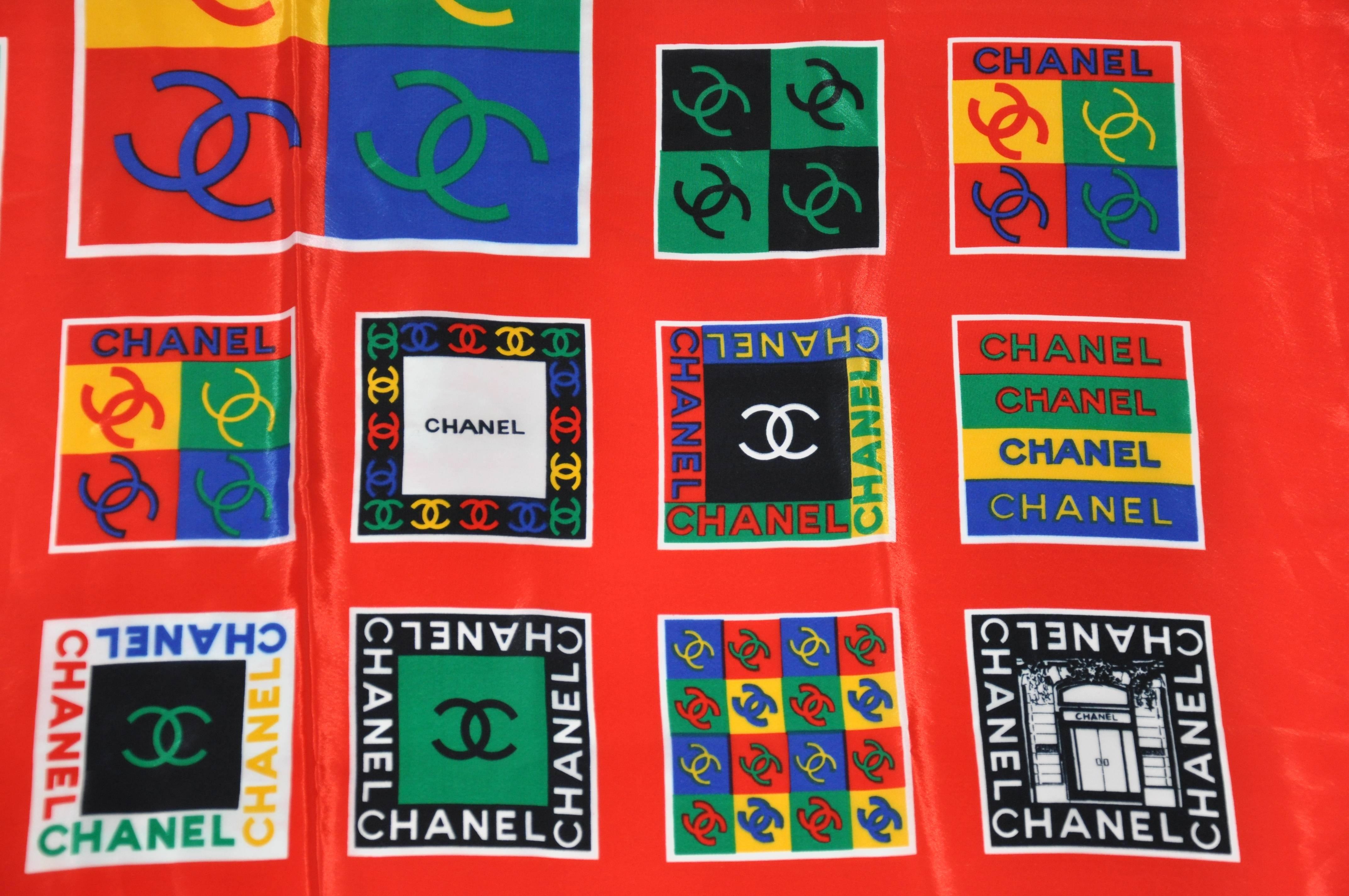           Chanel multi-color signature logo silk scarf is finished with rolled edges and measures 33